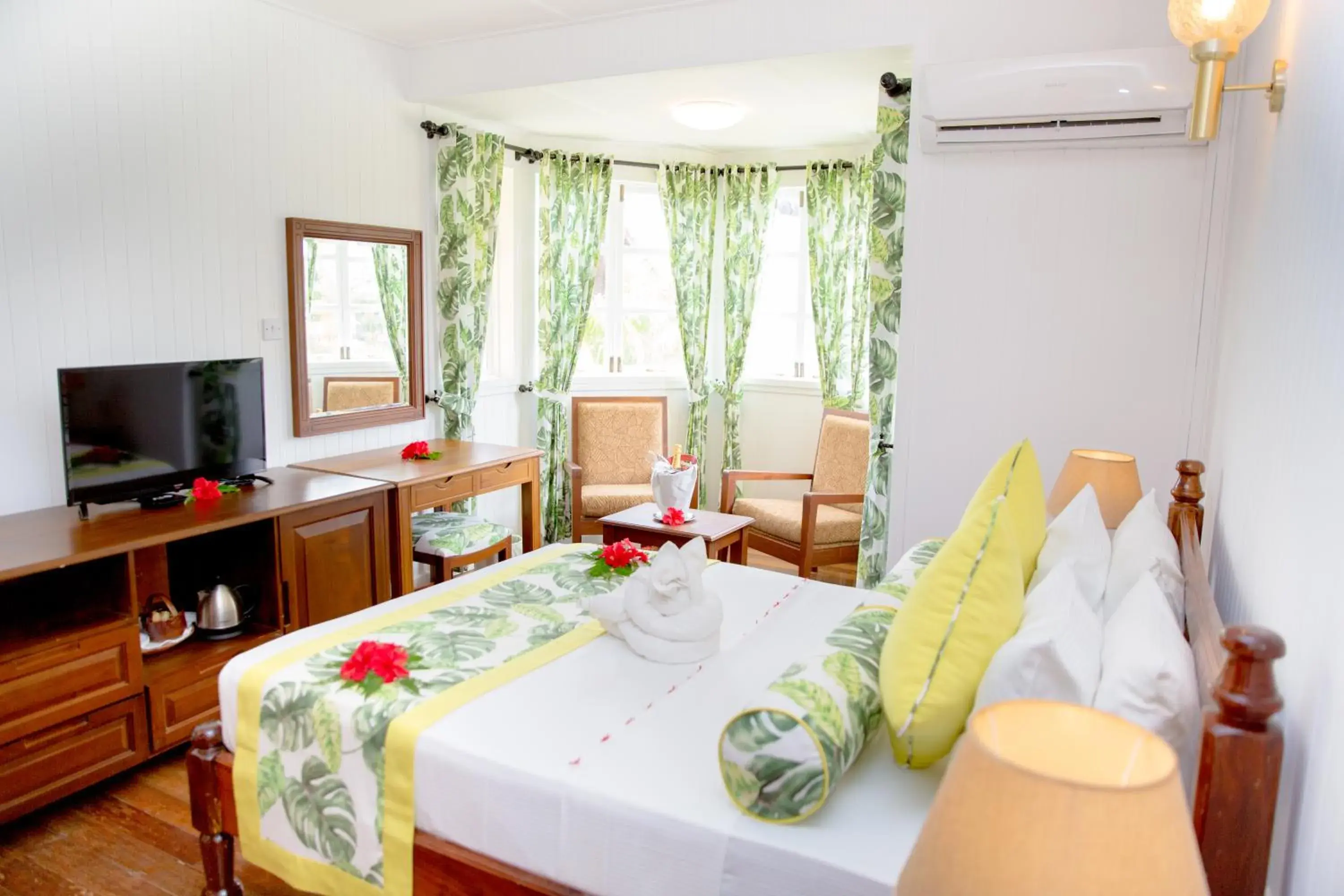 Bed in La Digue Island Lodge Bed in La Digue Island Lodge