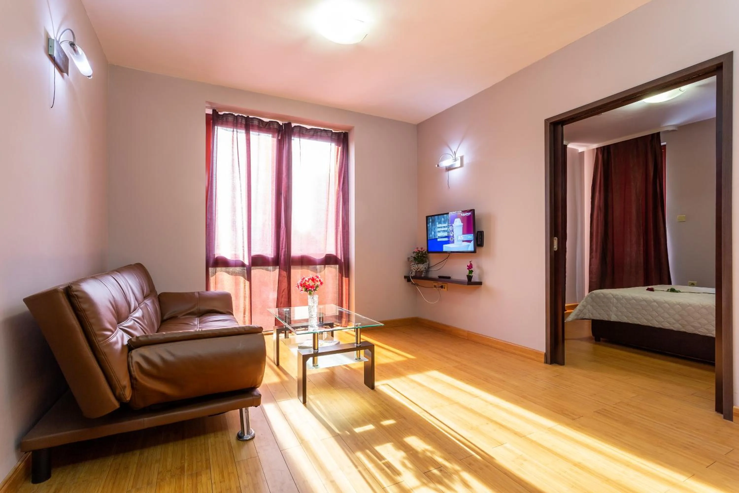 Living room, Bed in CityHome Aparthotel