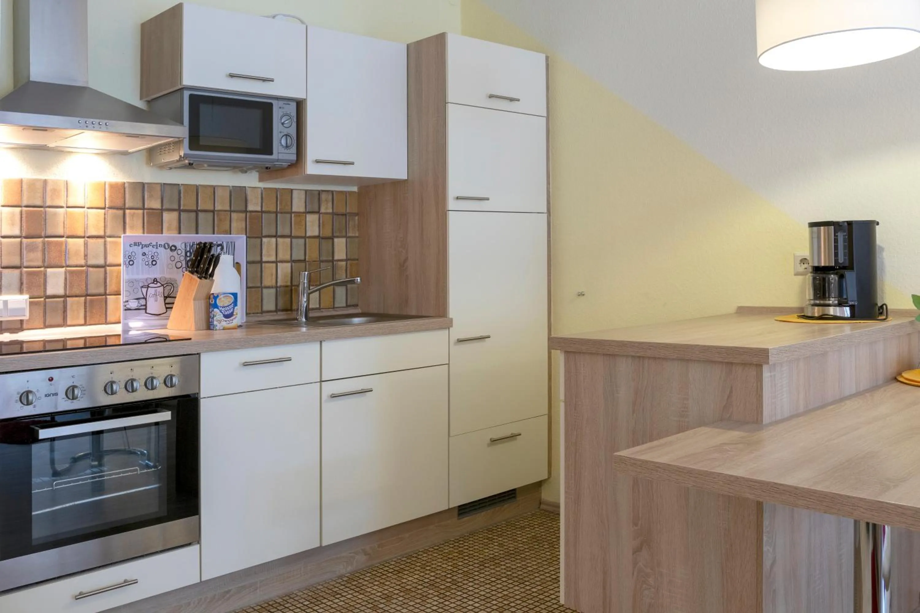 Kitchen or kitchenette in Haus Roseneck mit gratis Zugang zur Jod-Sole-Therme