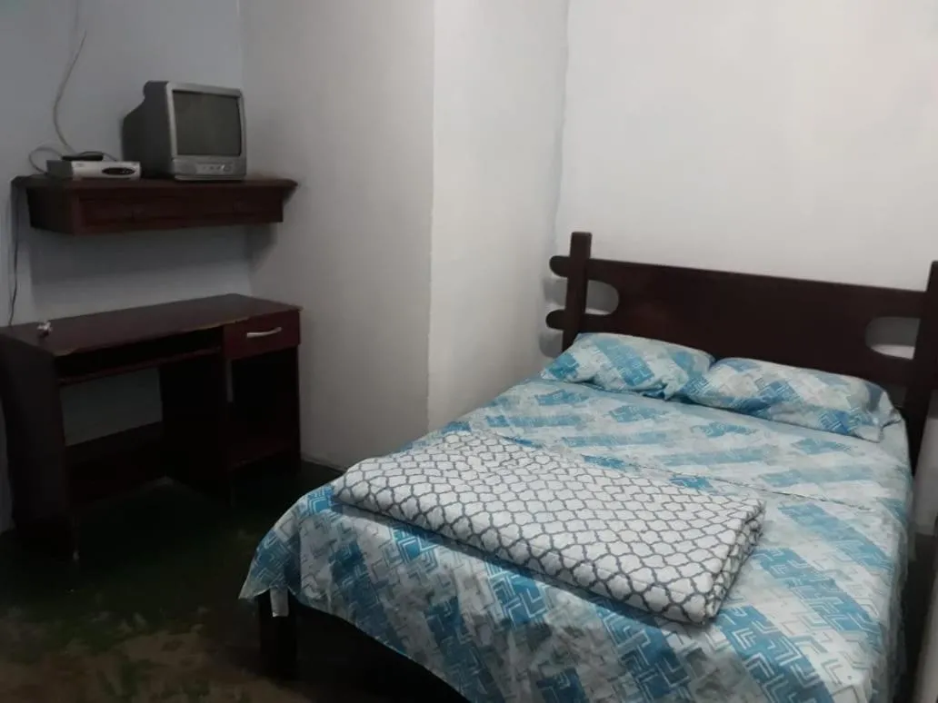 Bed in Pousada Mirante das Pedras