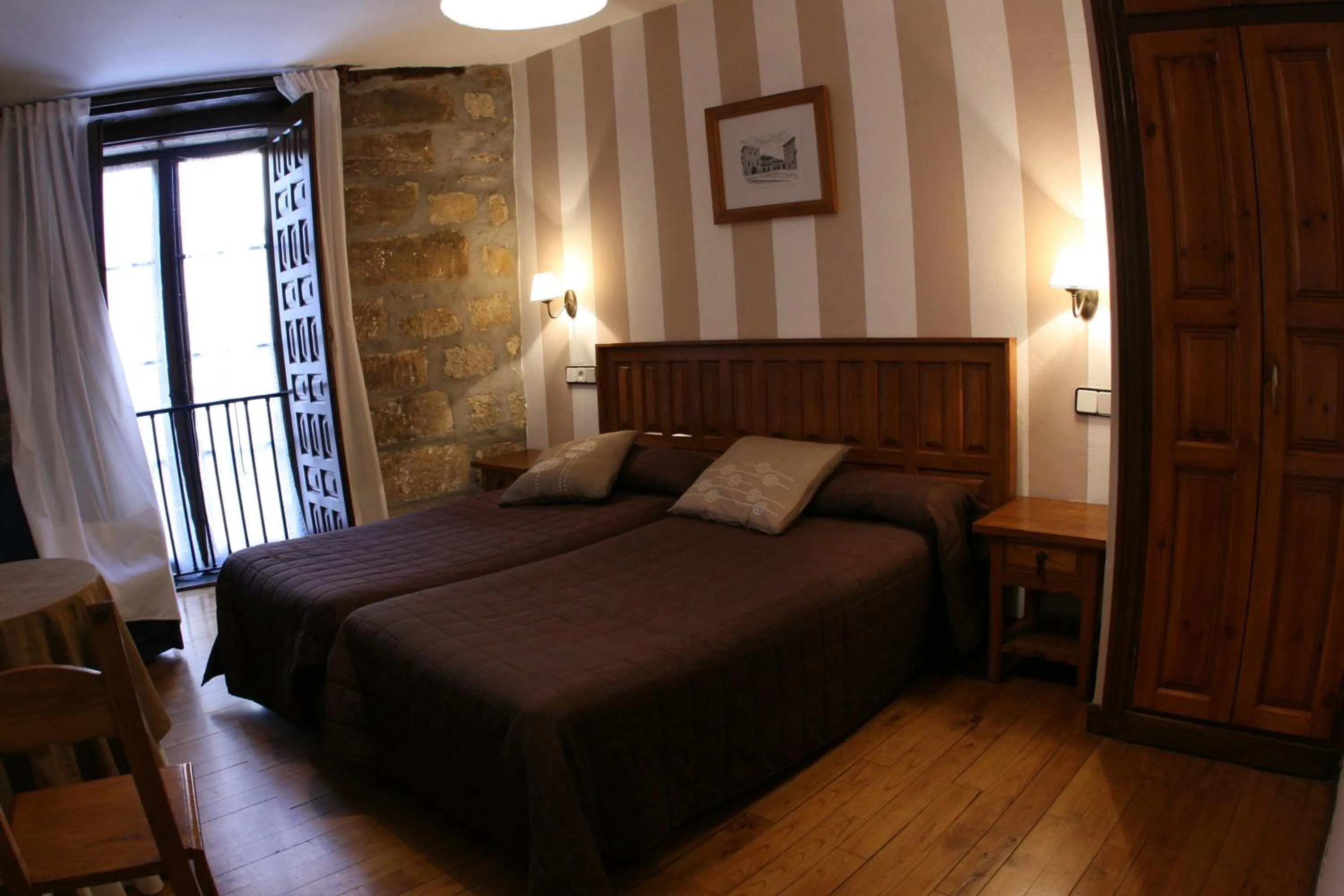 Photo of the whole room, Bed in Posada Santa Juliana