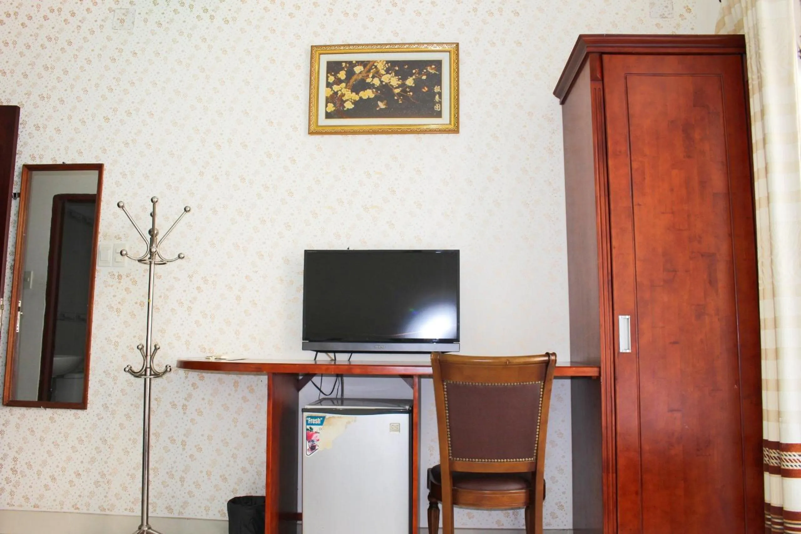 Communal lounge/ TV room in Mai Guest House