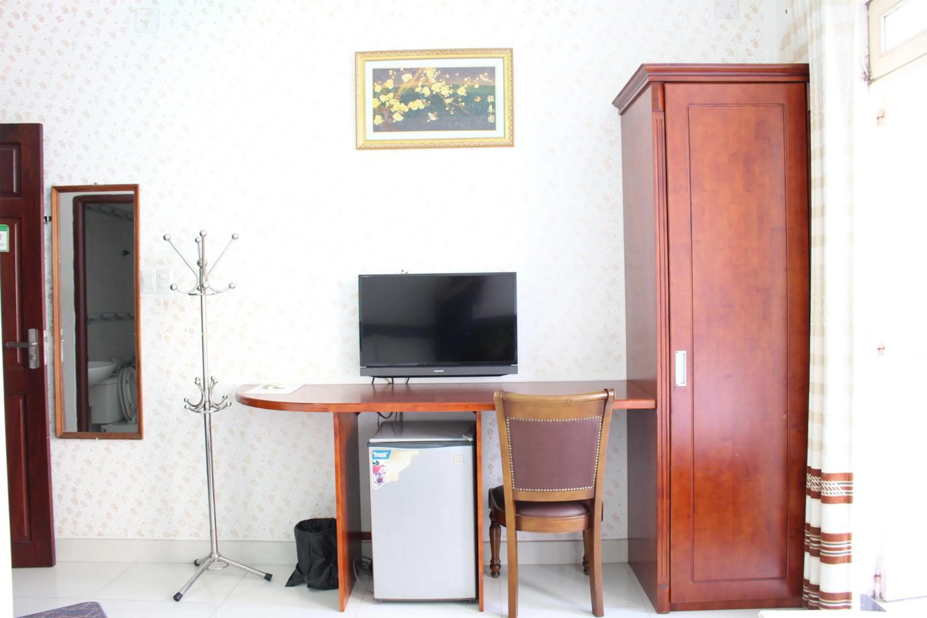 Communal lounge/ TV room in Mai Guest House