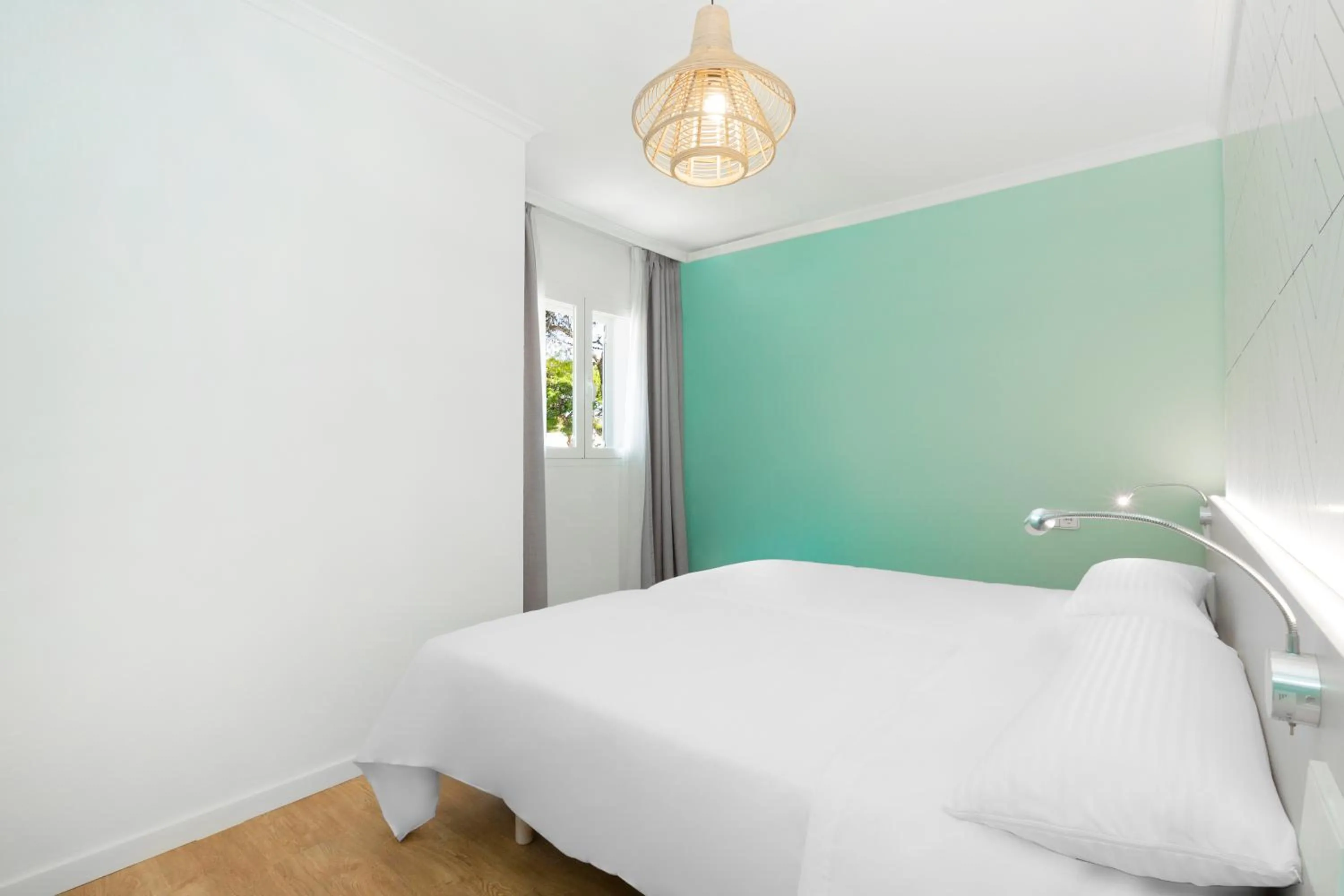 Bedroom, Bed in Apartamentos Los Arcos