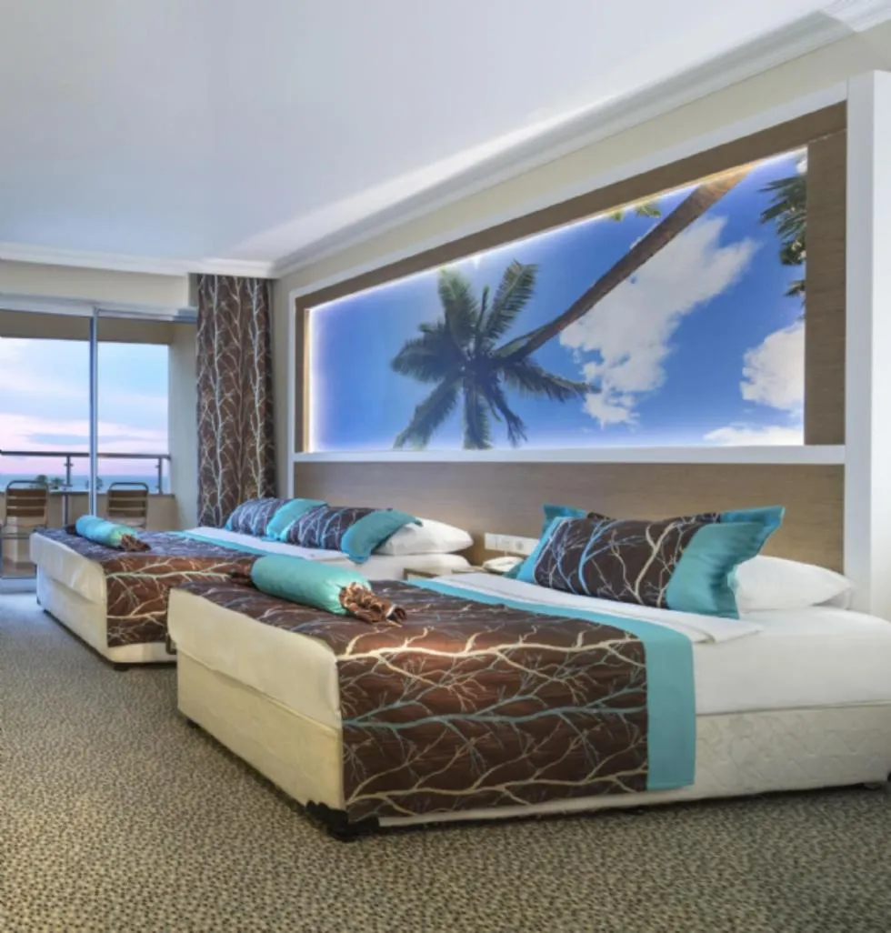 Bed in Saphir Hotel & Villas