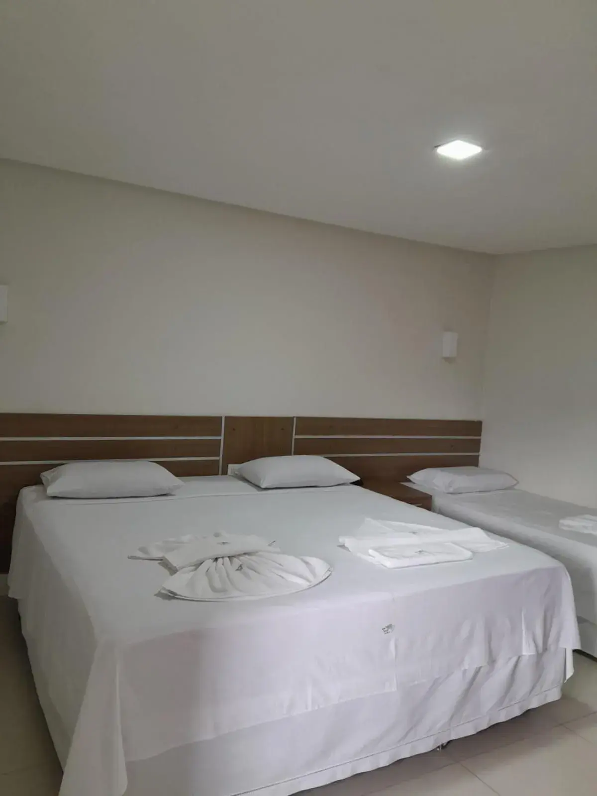 Economy Triple Room in Hotel Recanto Vip Economy Triple Room in Hotel Recanto Vip
