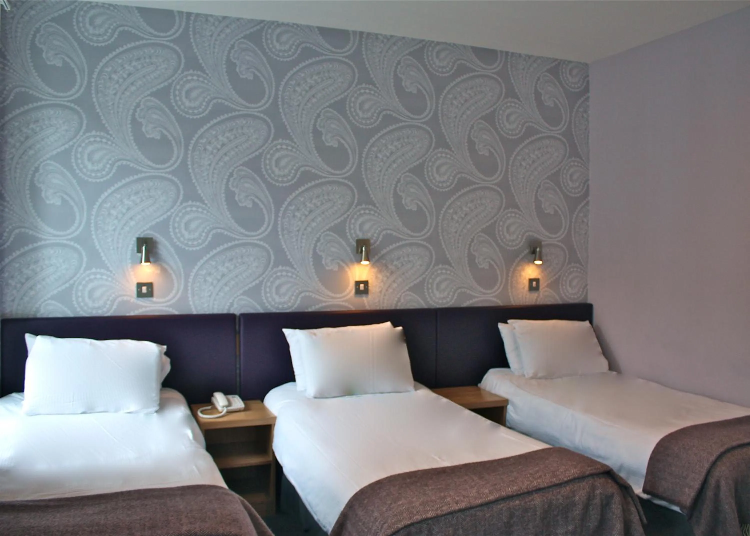 Bed in Jackson Court Hotel