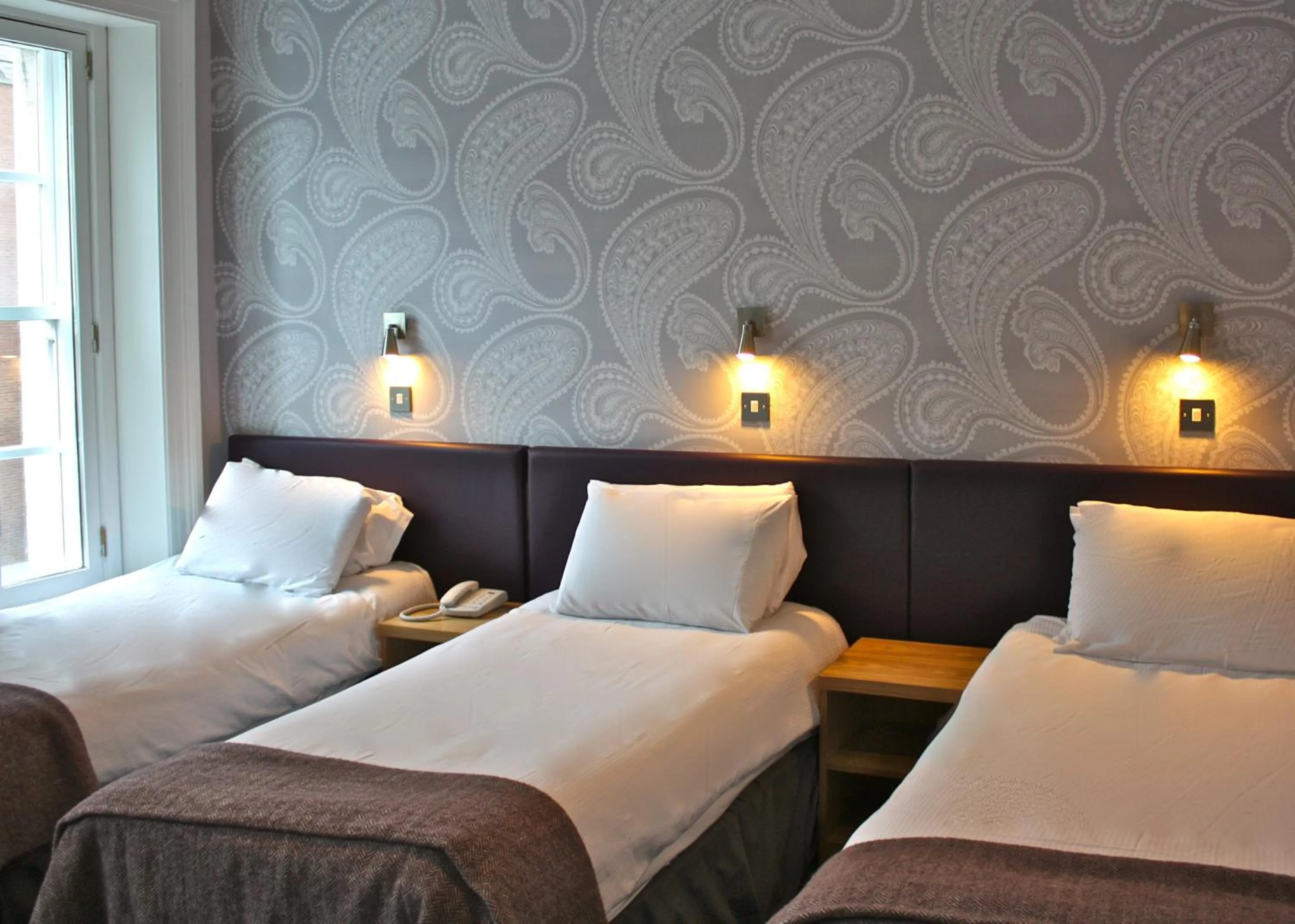 Bed in Jackson Court Hotel