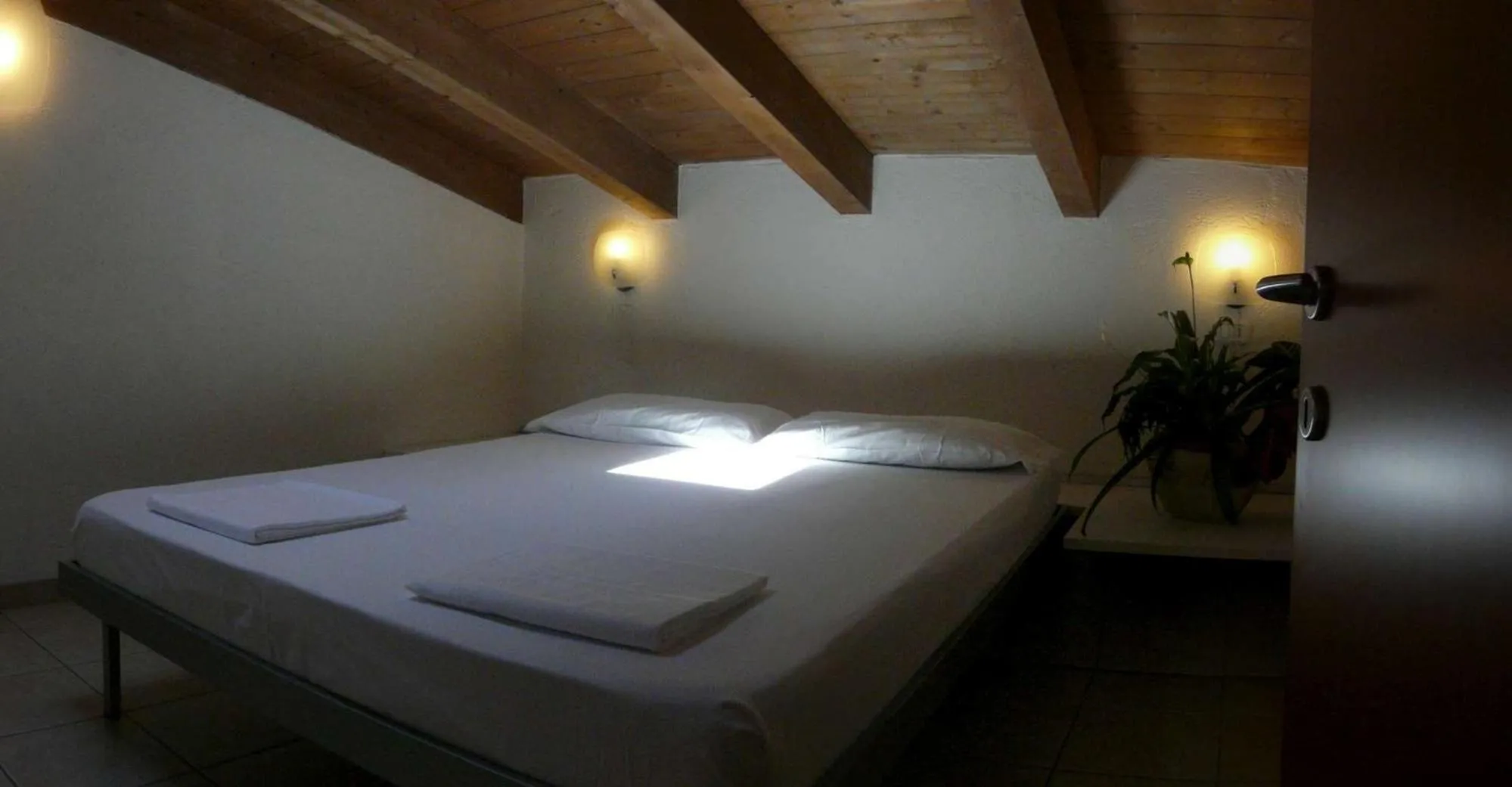 Bedroom, Bed in Appartamenti Gardastivo