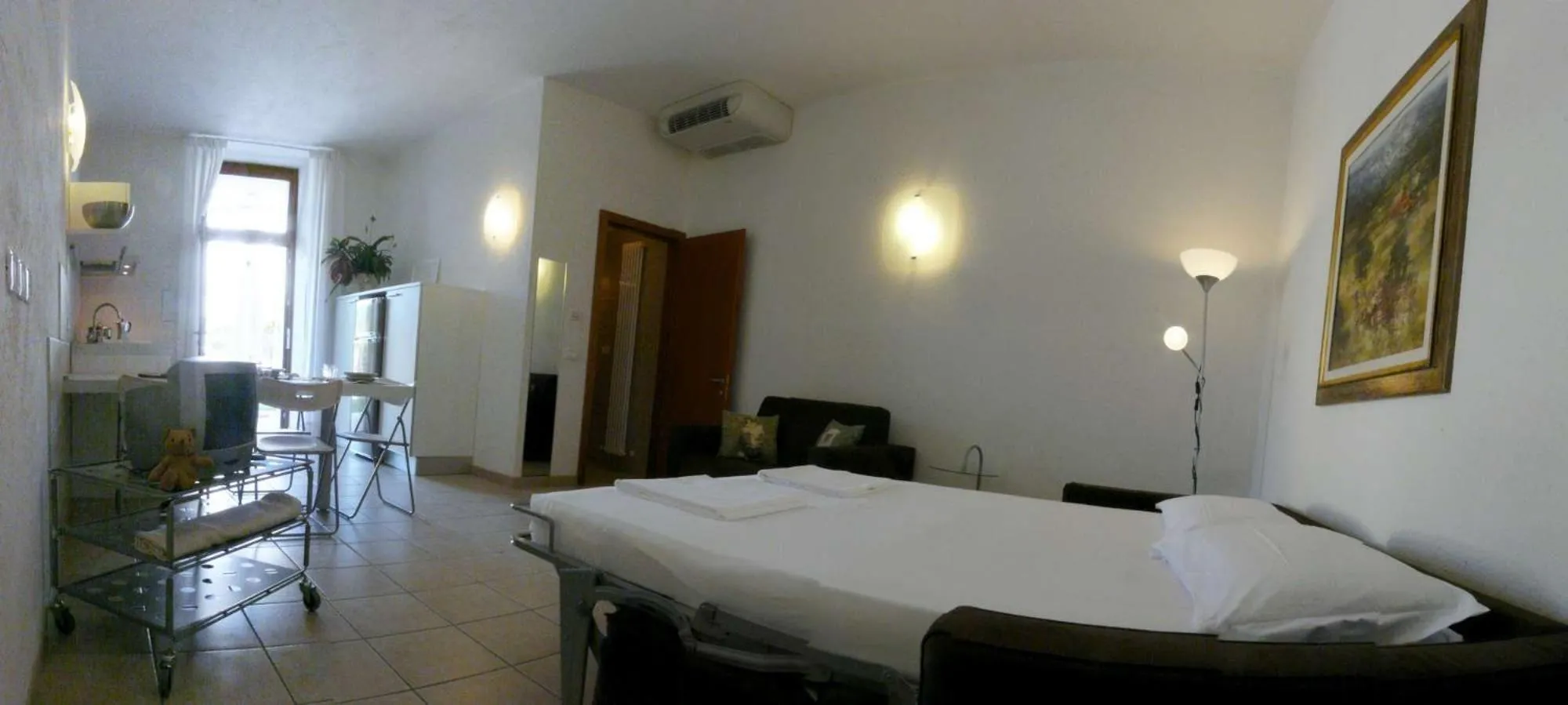 Photo of the whole room, Bed in Appartamenti Gardastivo