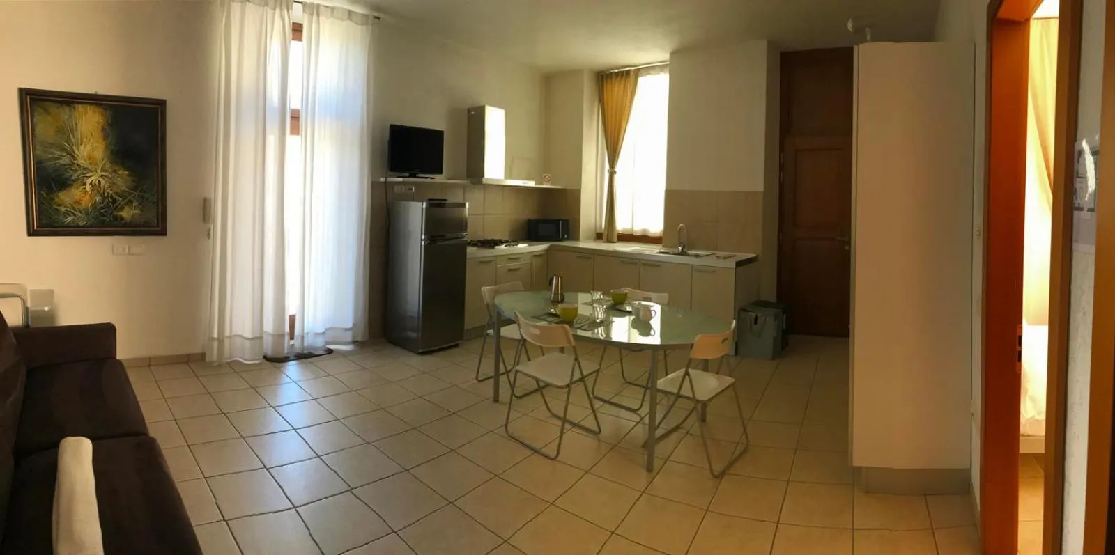 Kitchen or kitchenette in Appartamenti Gardastivo