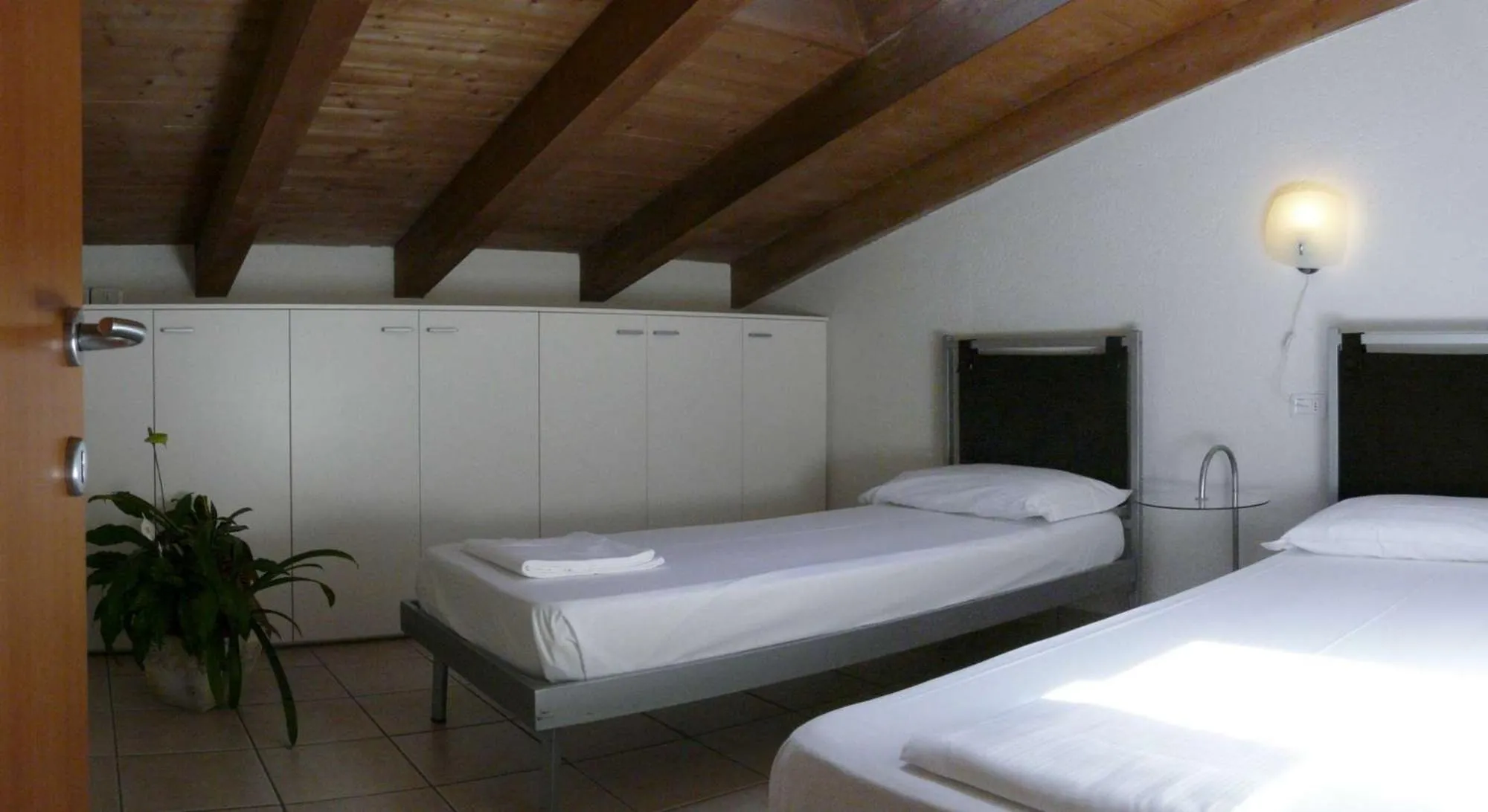 Bedroom, Bed in Appartamenti Gardastivo