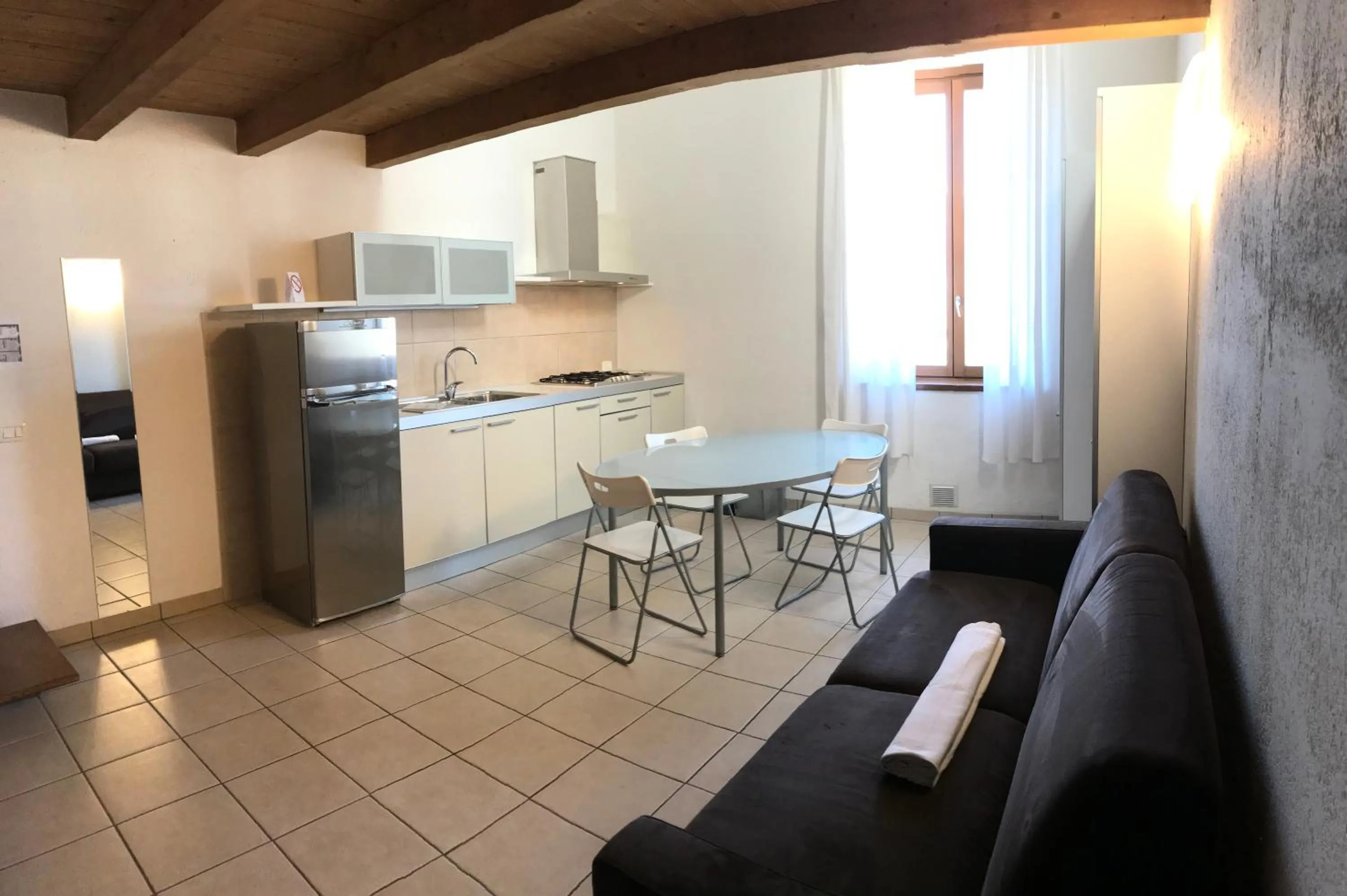 Kitchen or kitchenette in Appartamenti Gardastivo