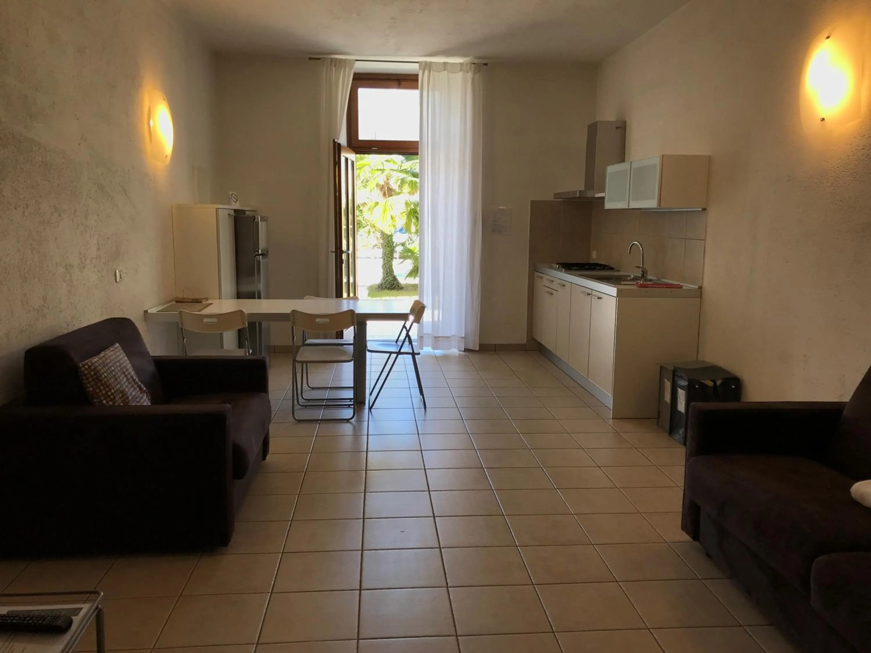Kitchen or kitchenette in Appartamenti Gardastivo