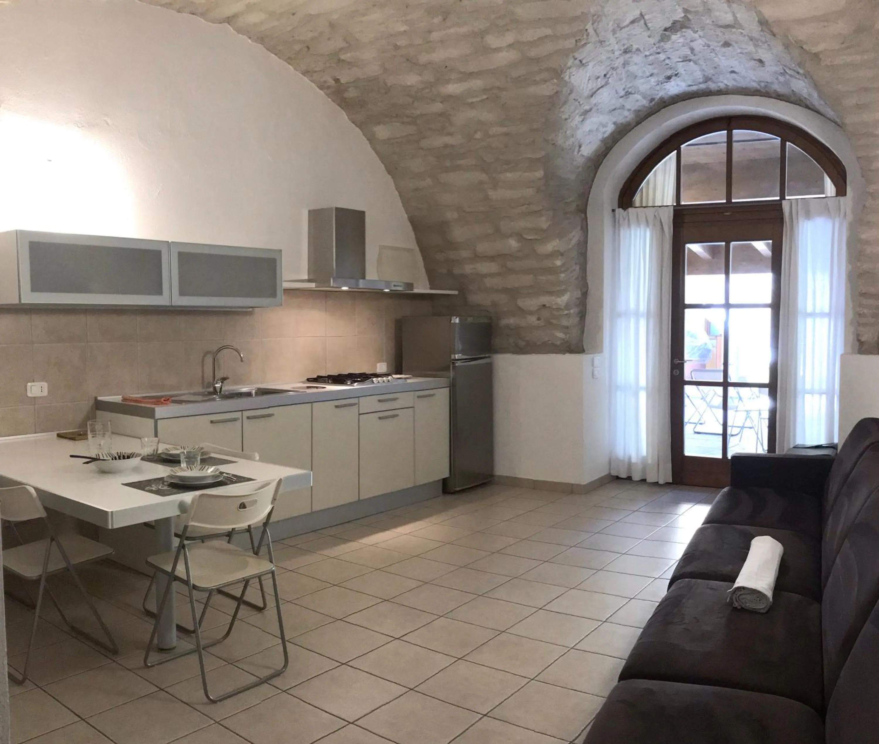 Kitchen or kitchenette in Appartamenti Gardastivo