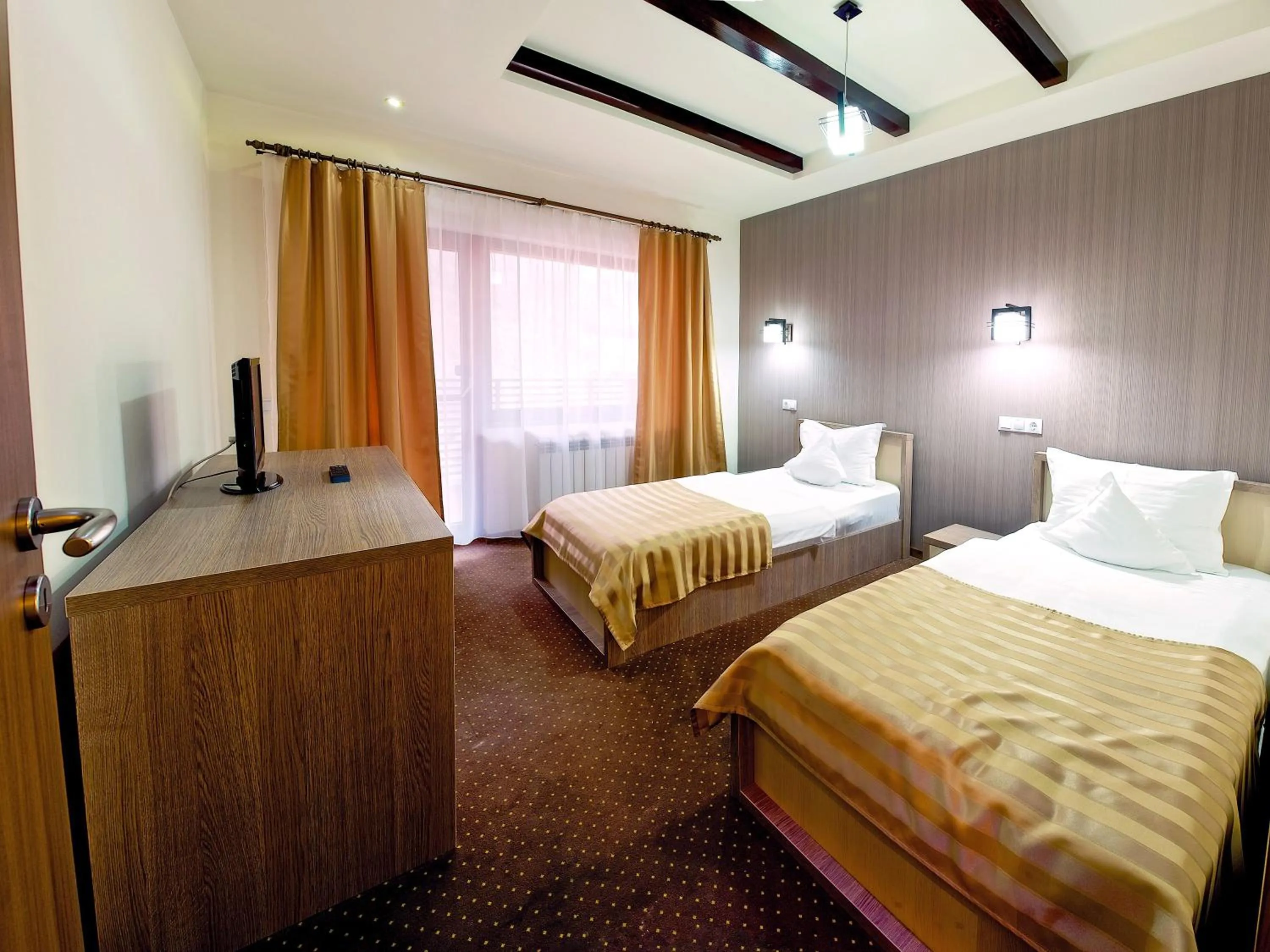 Photo of the whole room, Bed in Pensiunea JOJO2