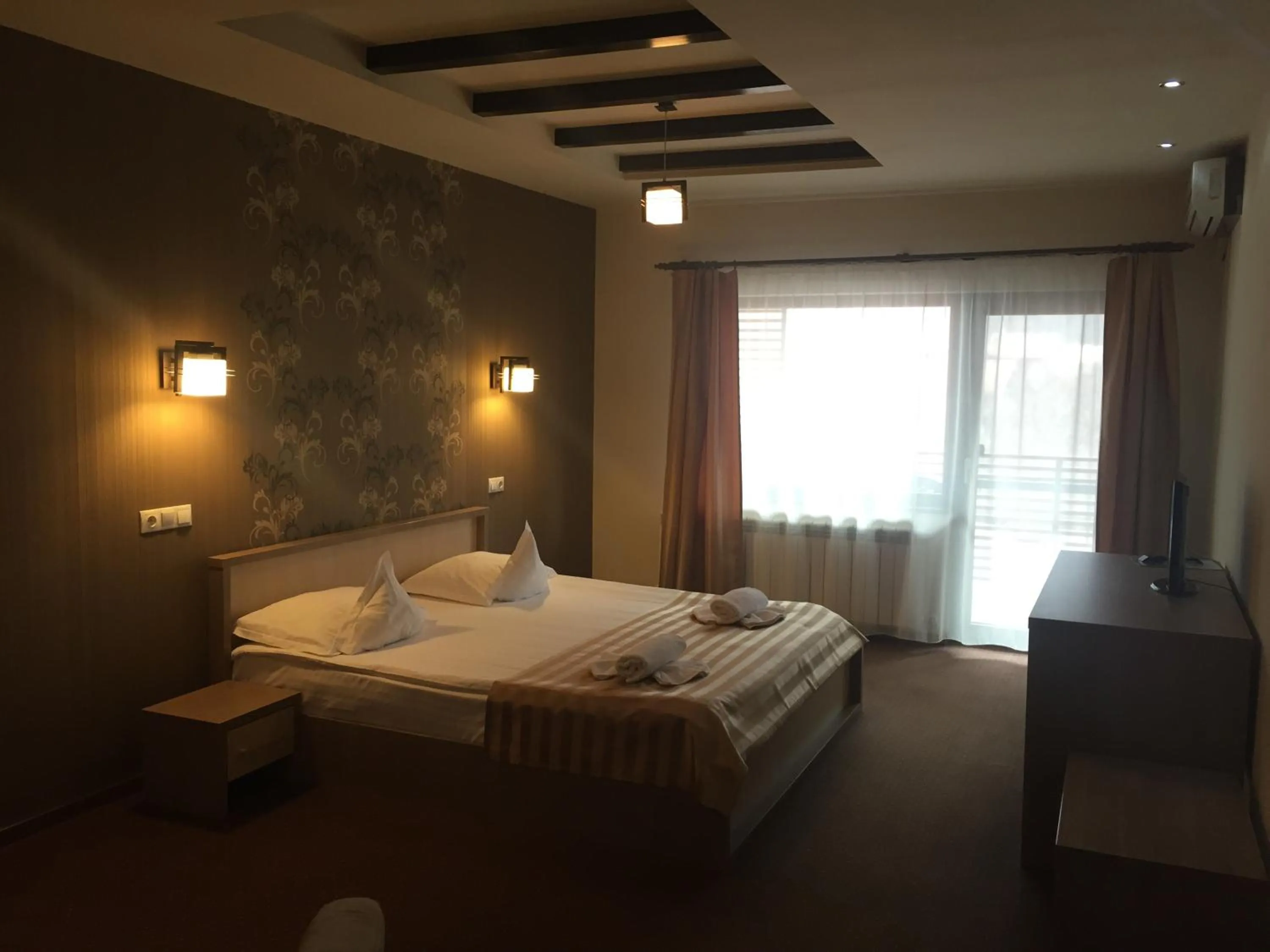 Photo of the whole room, Bed in Pensiunea JOJO2