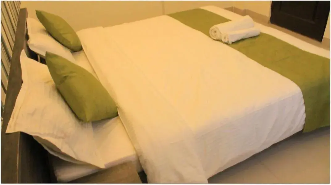 Bed in Magnus Calypso Suites Viman Nagar Bed in Magnus Calypso Suites Viman Nagar