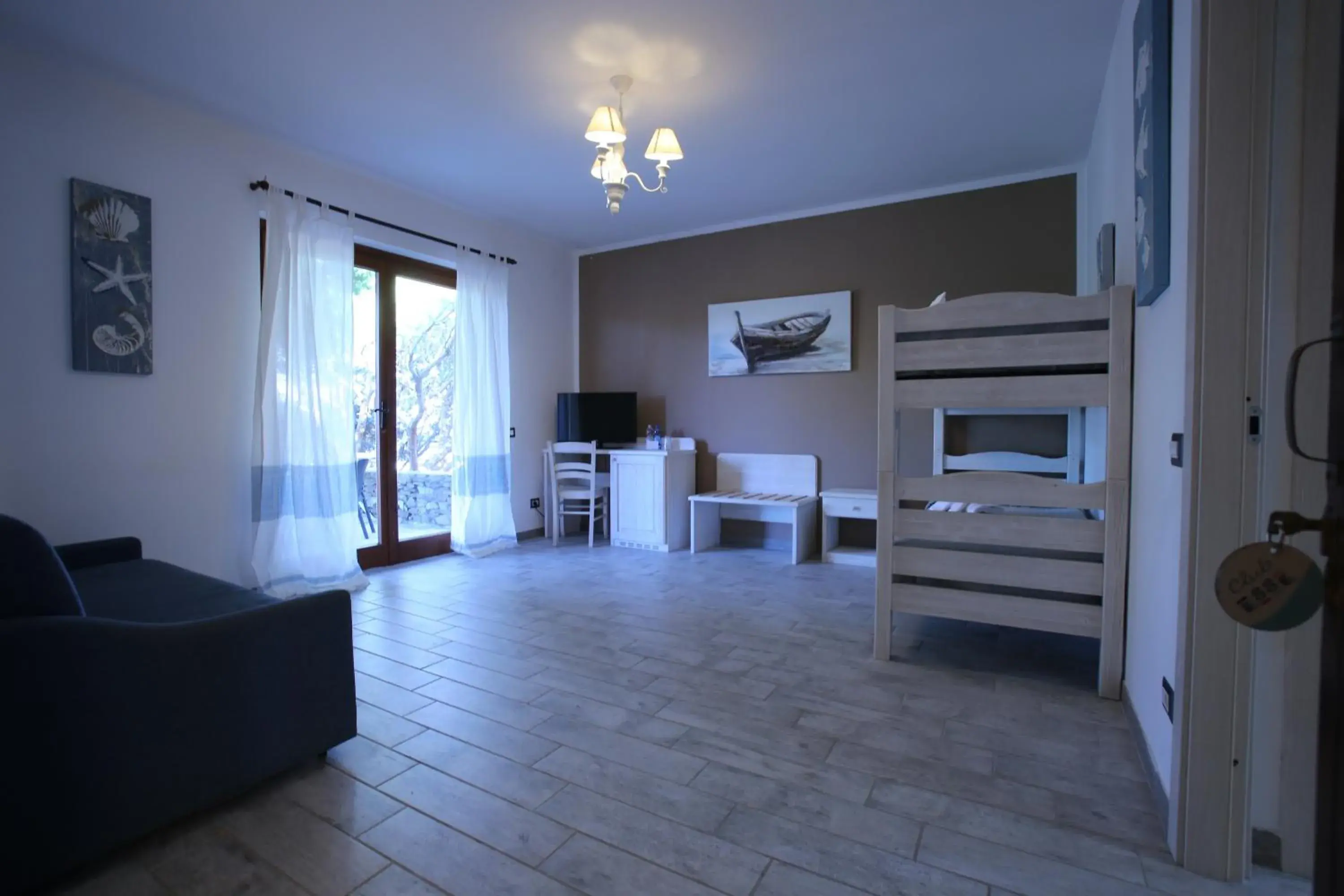 Living room, Bed in Club Esse Sporting Living room, Bed in Club Esse Sporting