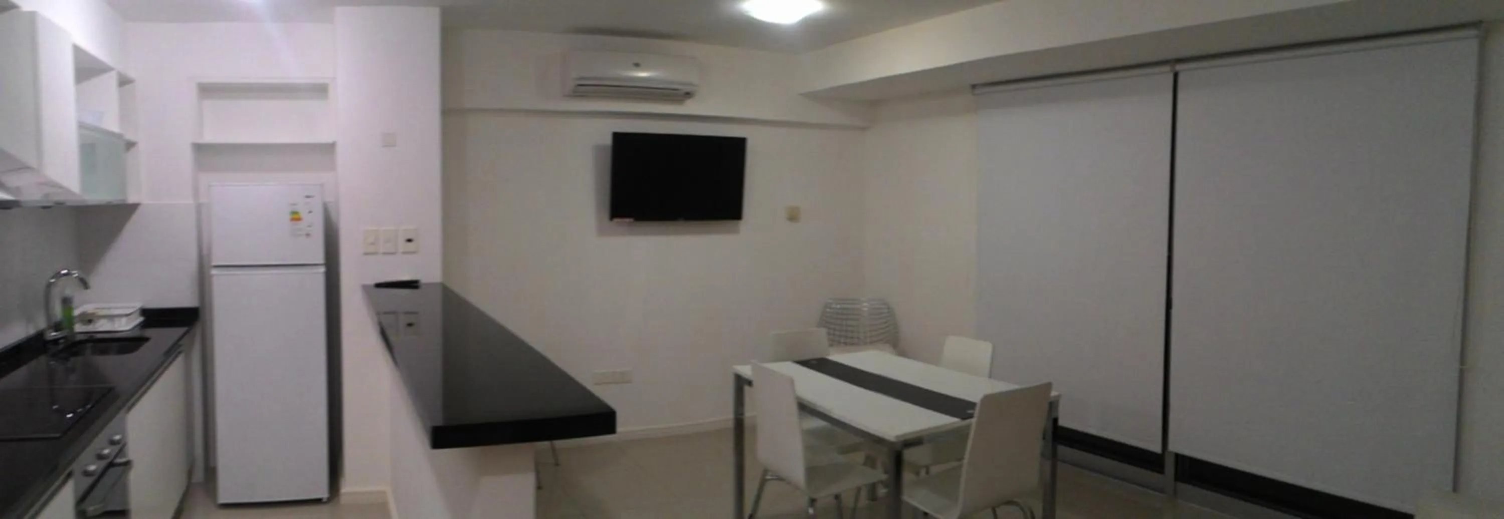 Kitchen or kitchenette in Arenas del Mar Apartments