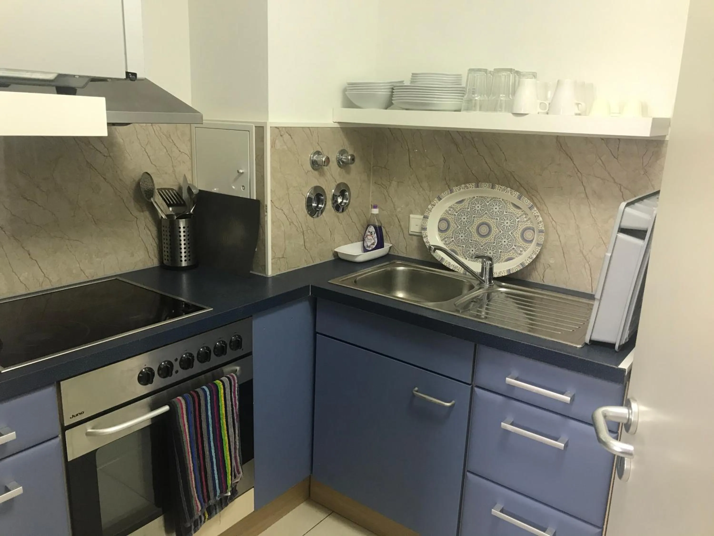 Kitchen or kitchenette in Baynunah Suites Aparthotel