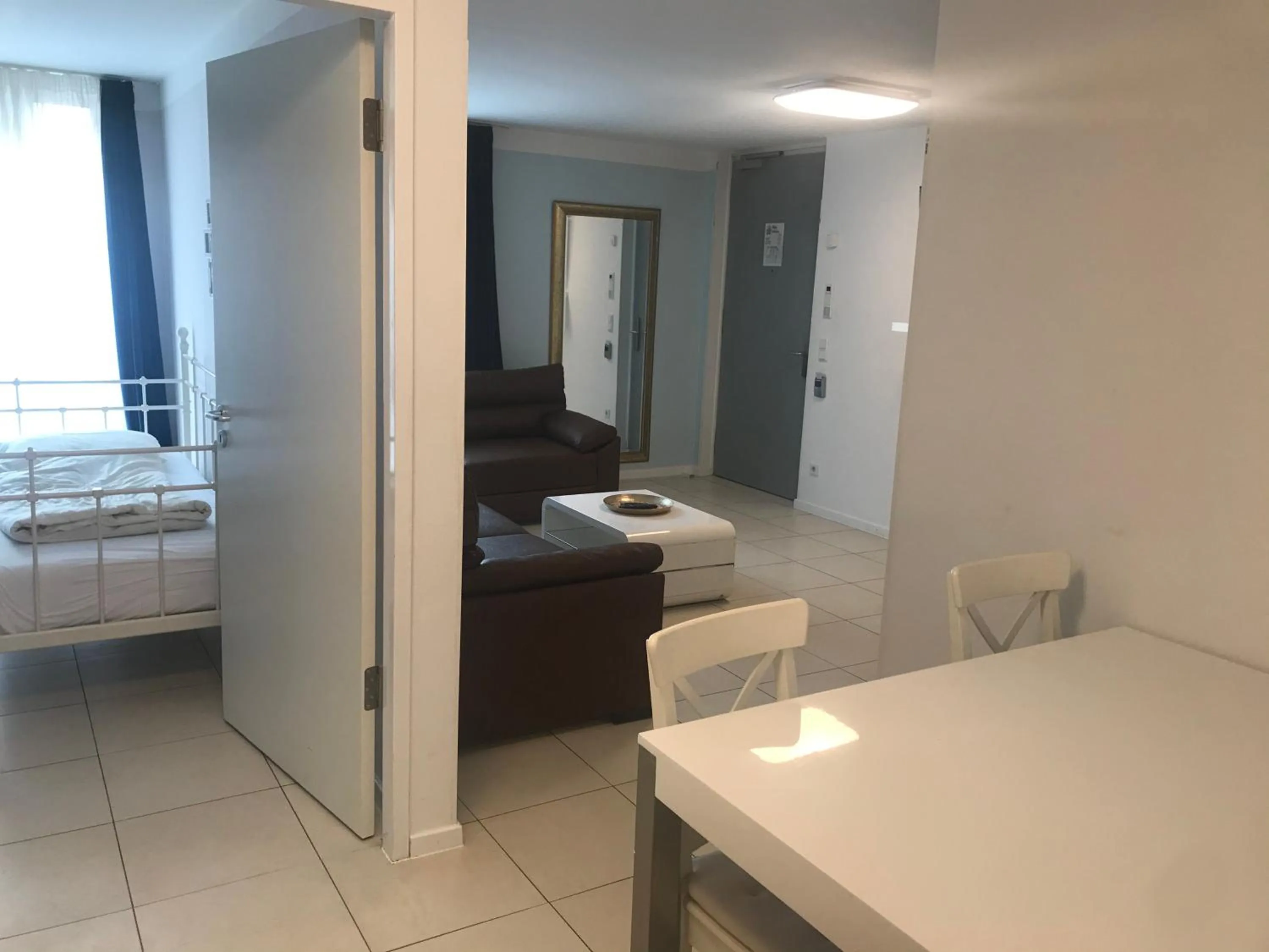 Living room, Bed in Baynunah Suites Aparthotel