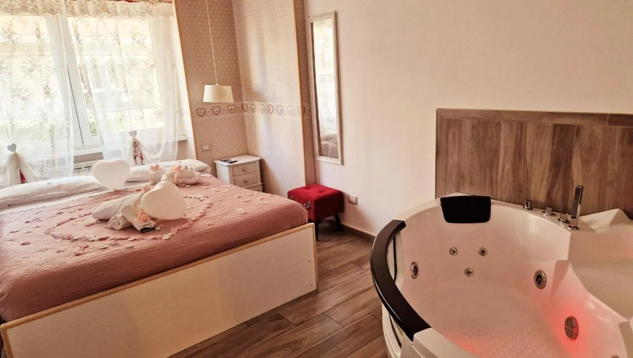 Photo of the whole room, Bed in Il Mare Di Roma Luxury