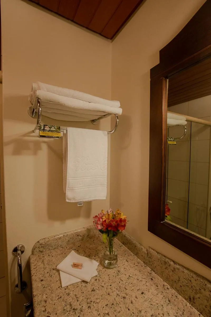 Bed in Pousada Vovó Carolina