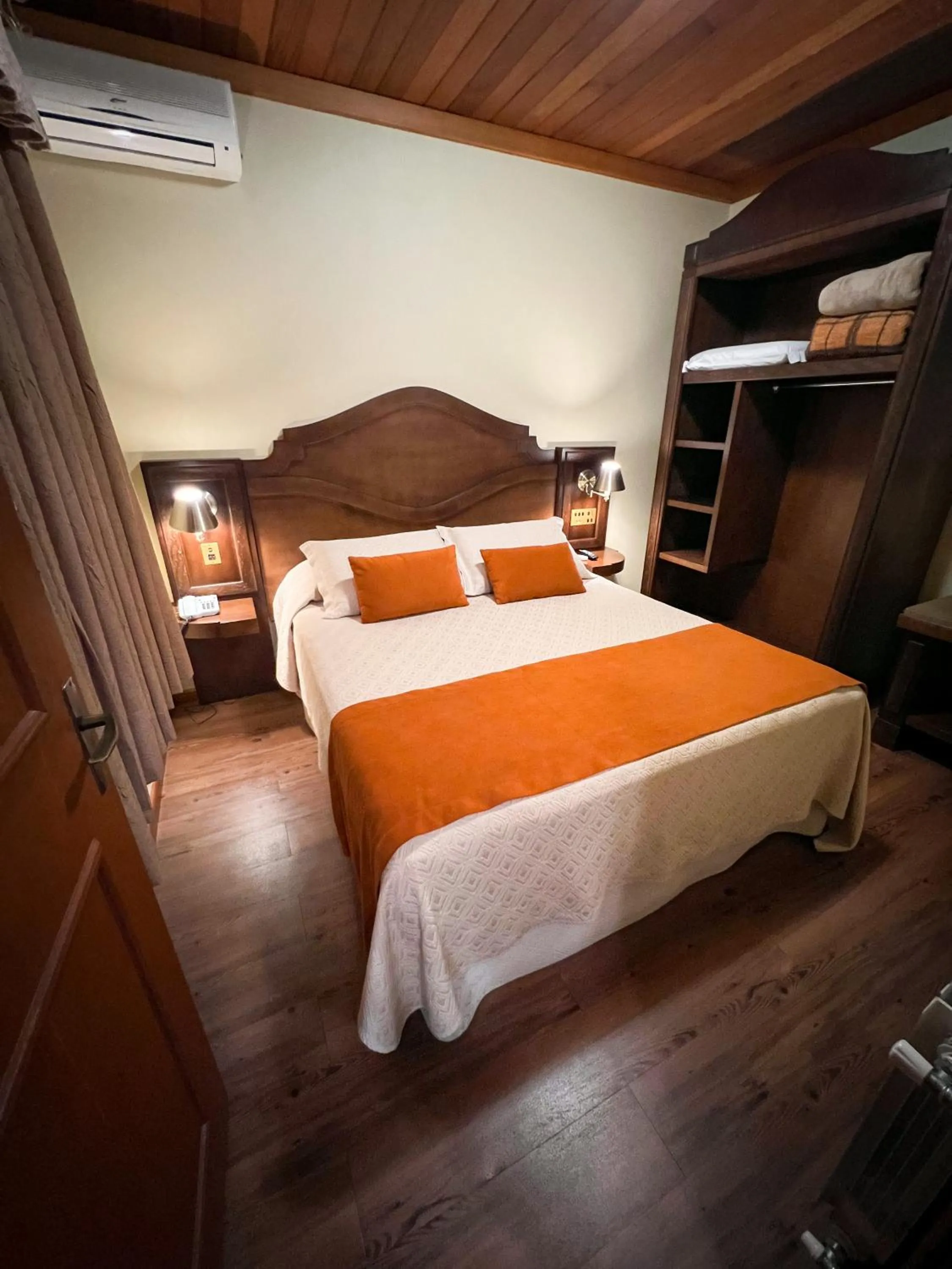 Bed in Pousada Vovó Carolina