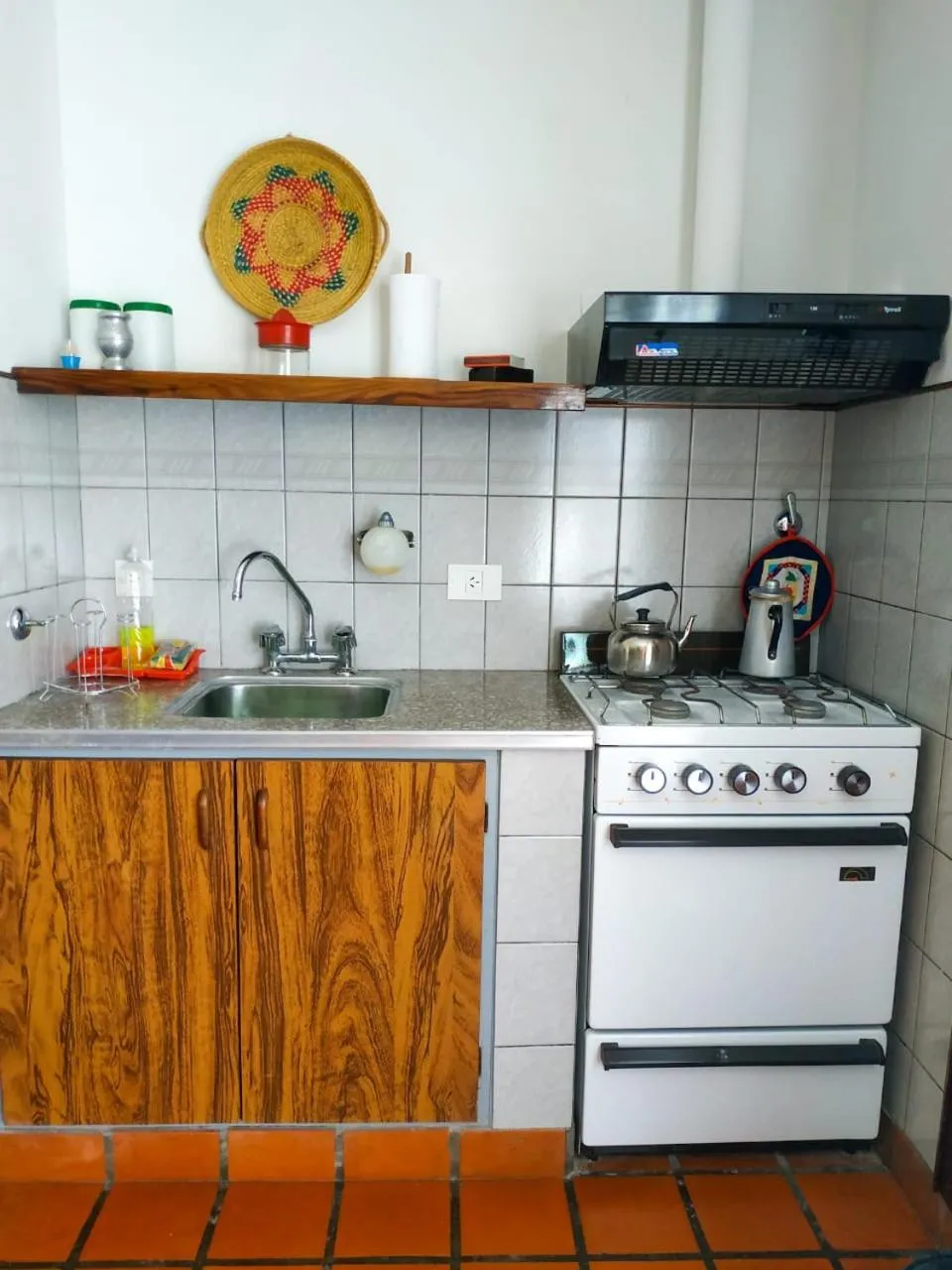 Kitchen or kitchenette in Departamentos Arco Iris Tandil