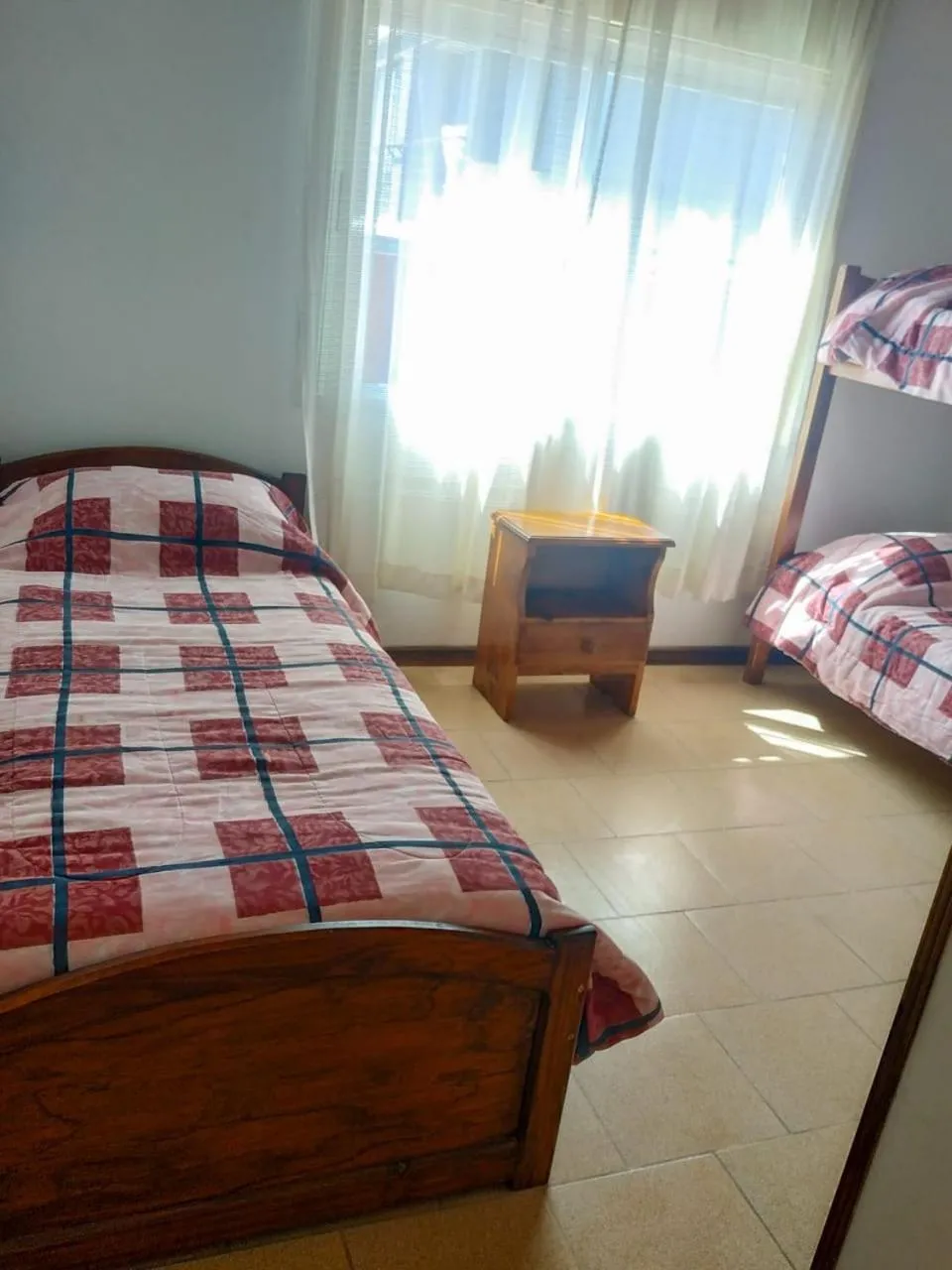 Bedroom, Bed in Departamentos Arco Iris Tandil