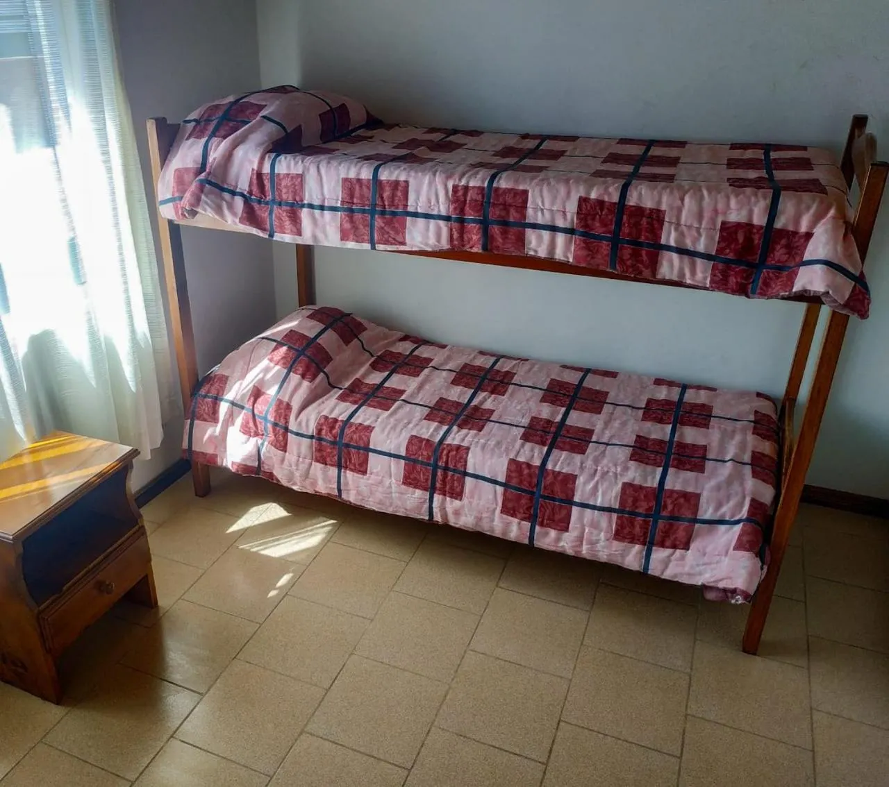 Bedroom, Bed in Departamentos Arco Iris Tandil