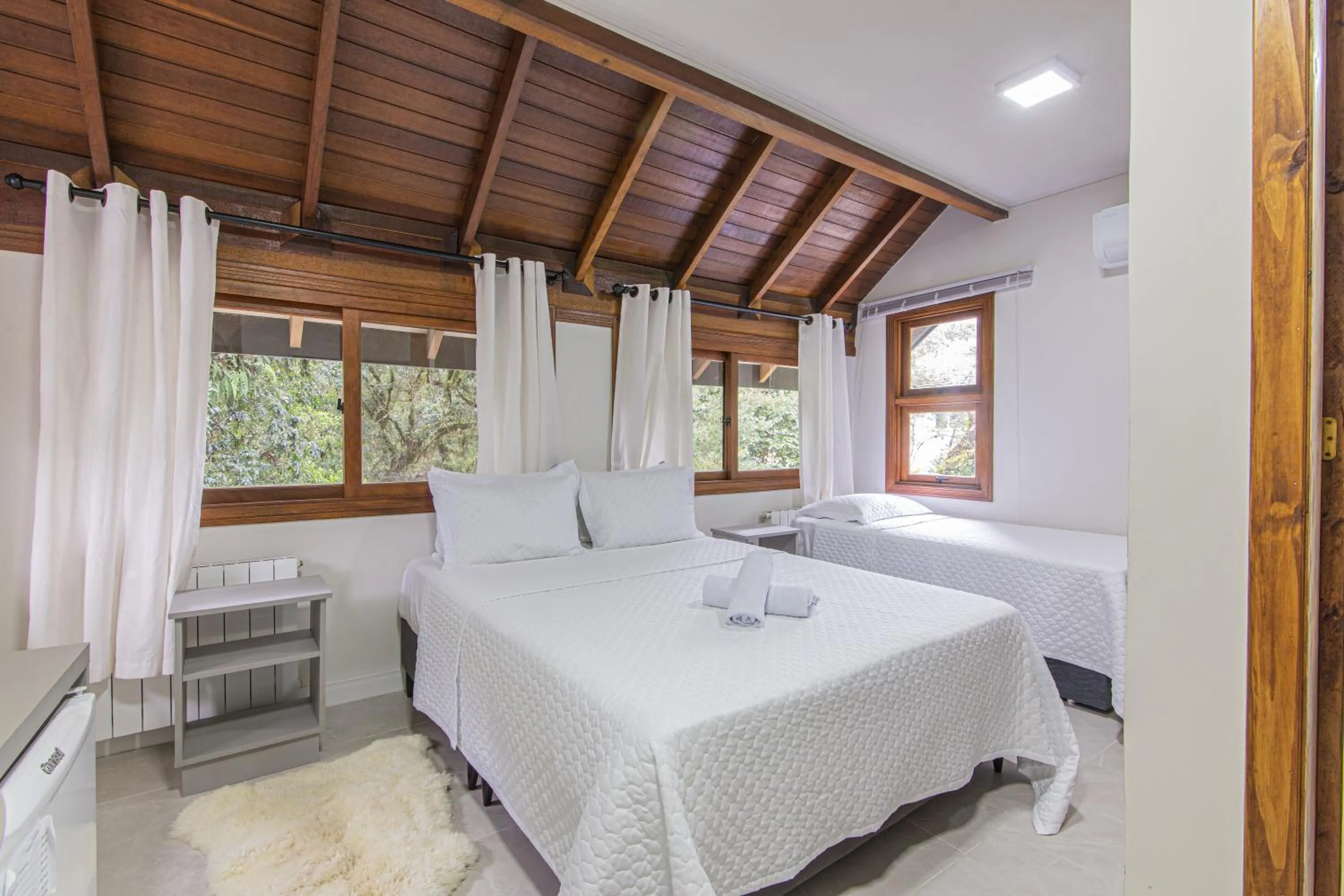 Bed in Pousada Villa Verde
