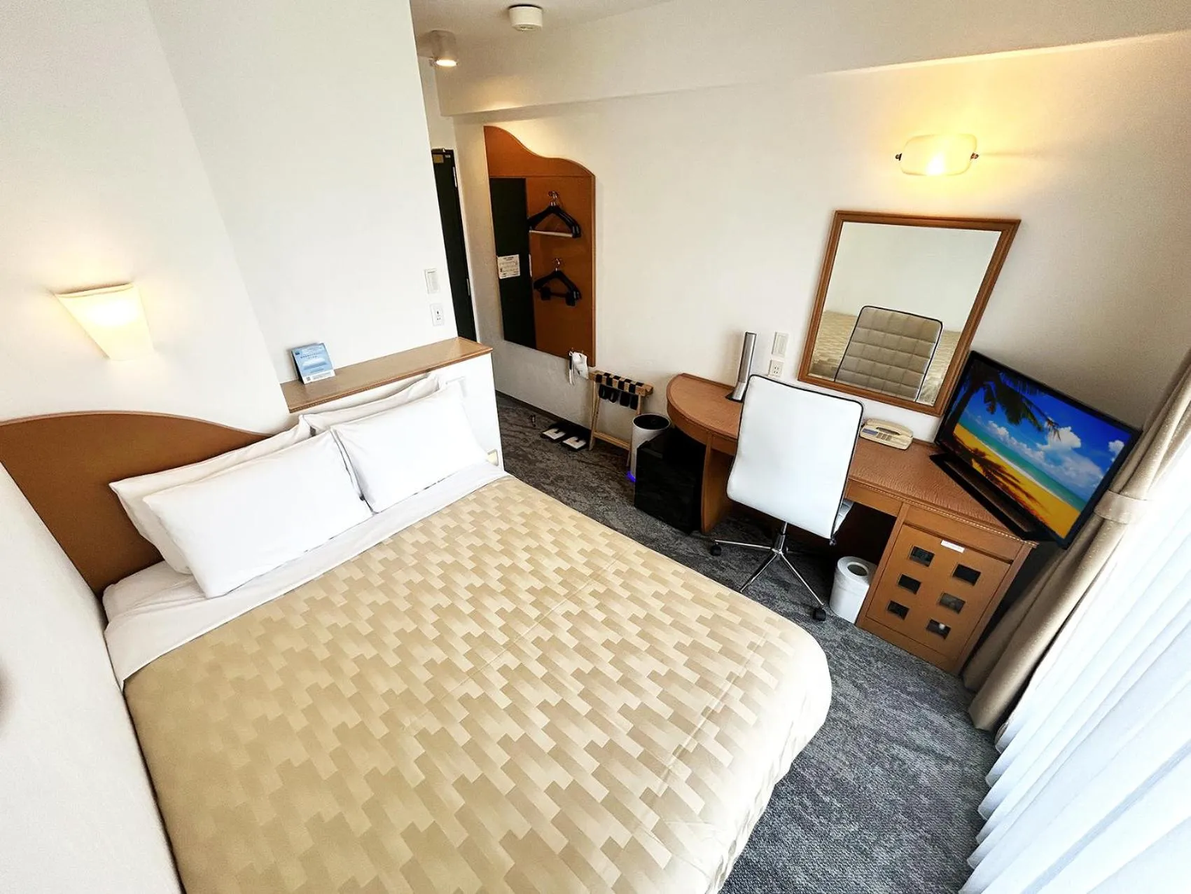 Bed in Naha Beach Side Hotel