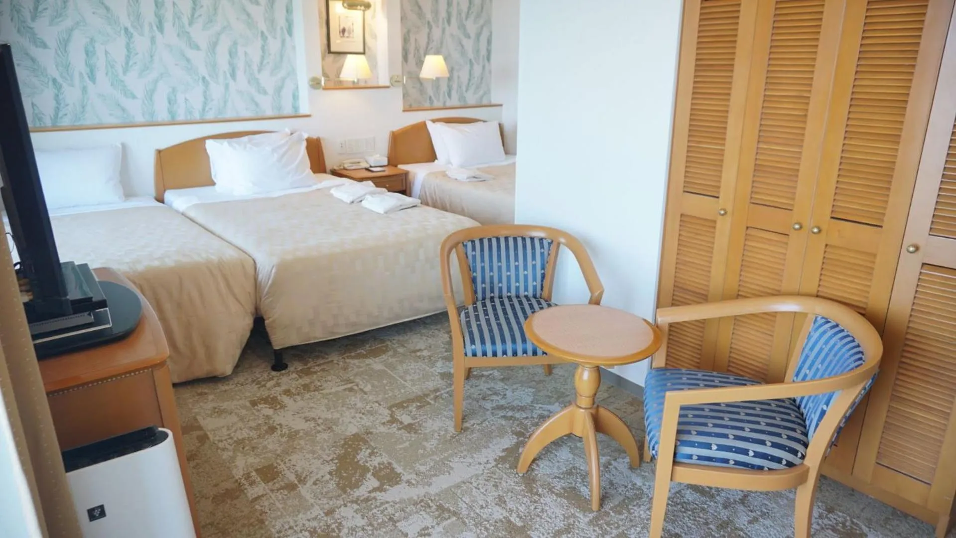 Bed in Naha Beach Side Hotel