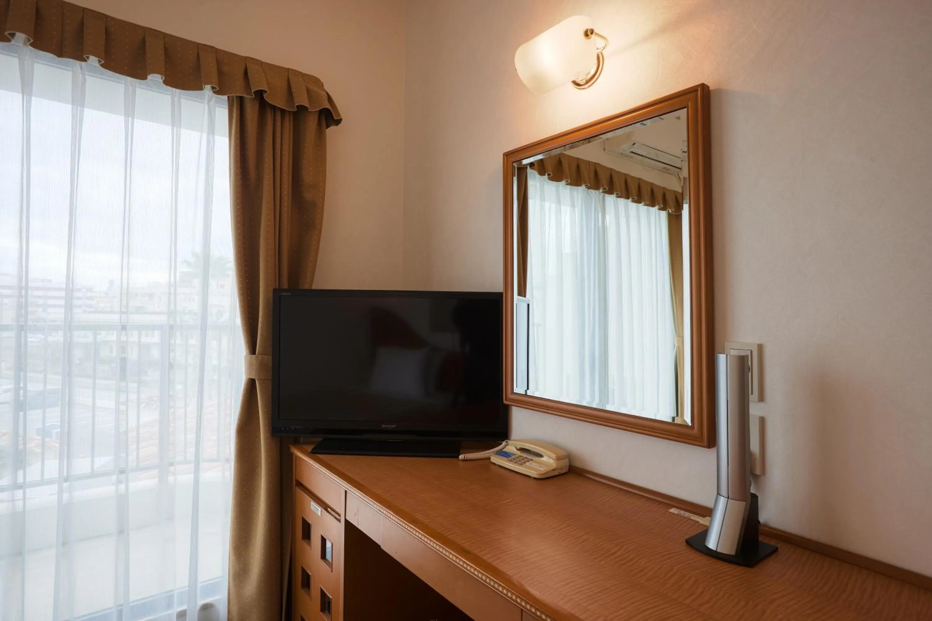 Photo of the whole room in Naha Beach Side Hotel