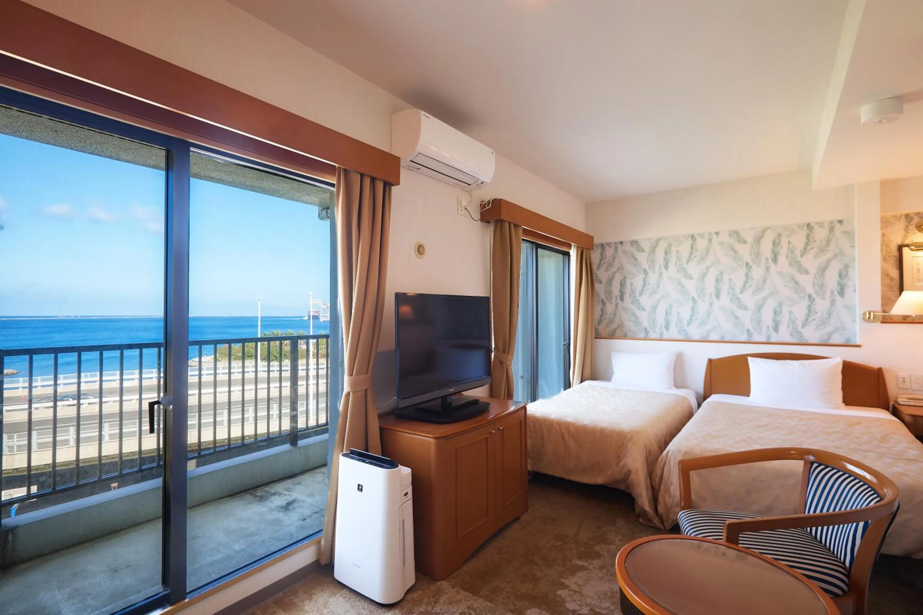 Photo of the whole room, Bed in Naha Beach Side Hotel