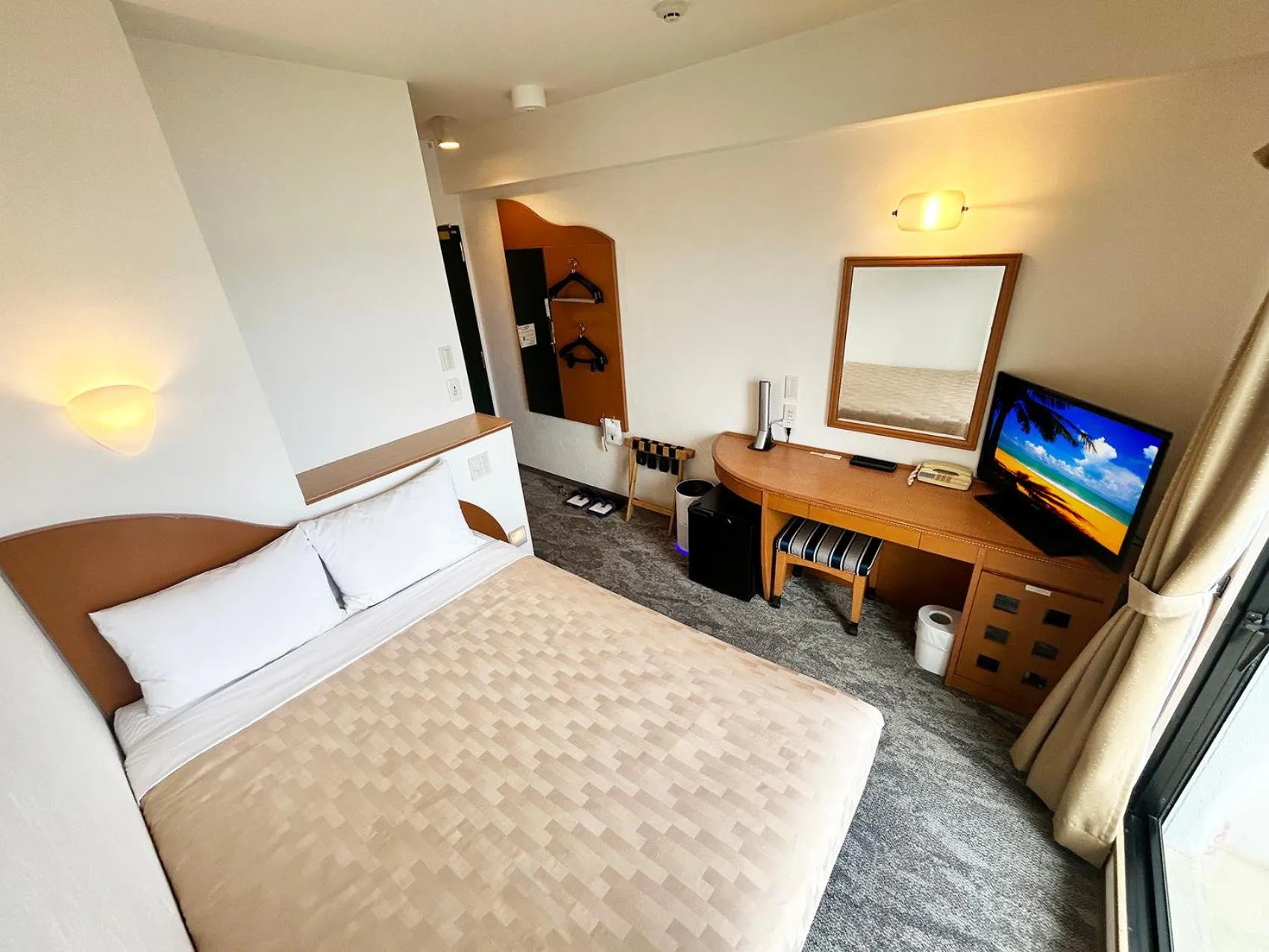 Bed in Naha Beach Side Hotel