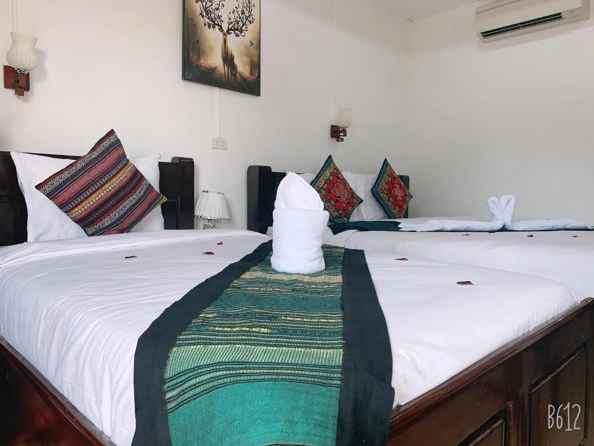 Bed in Jasmine Vangvieng Hotel