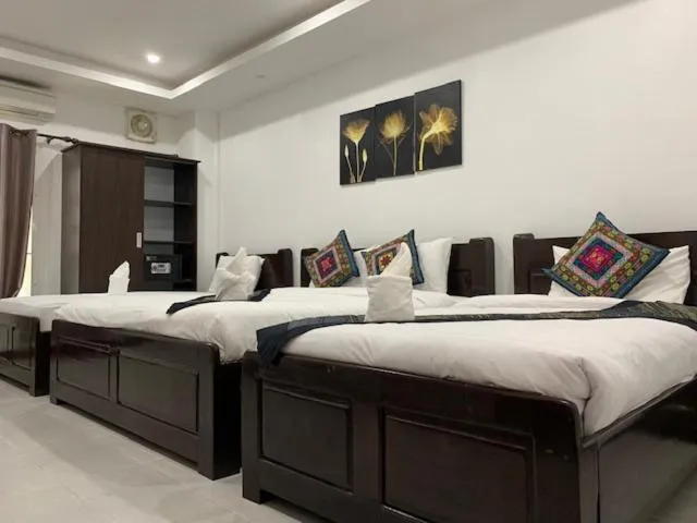 Bed in Jasmine Vangvieng Hotel