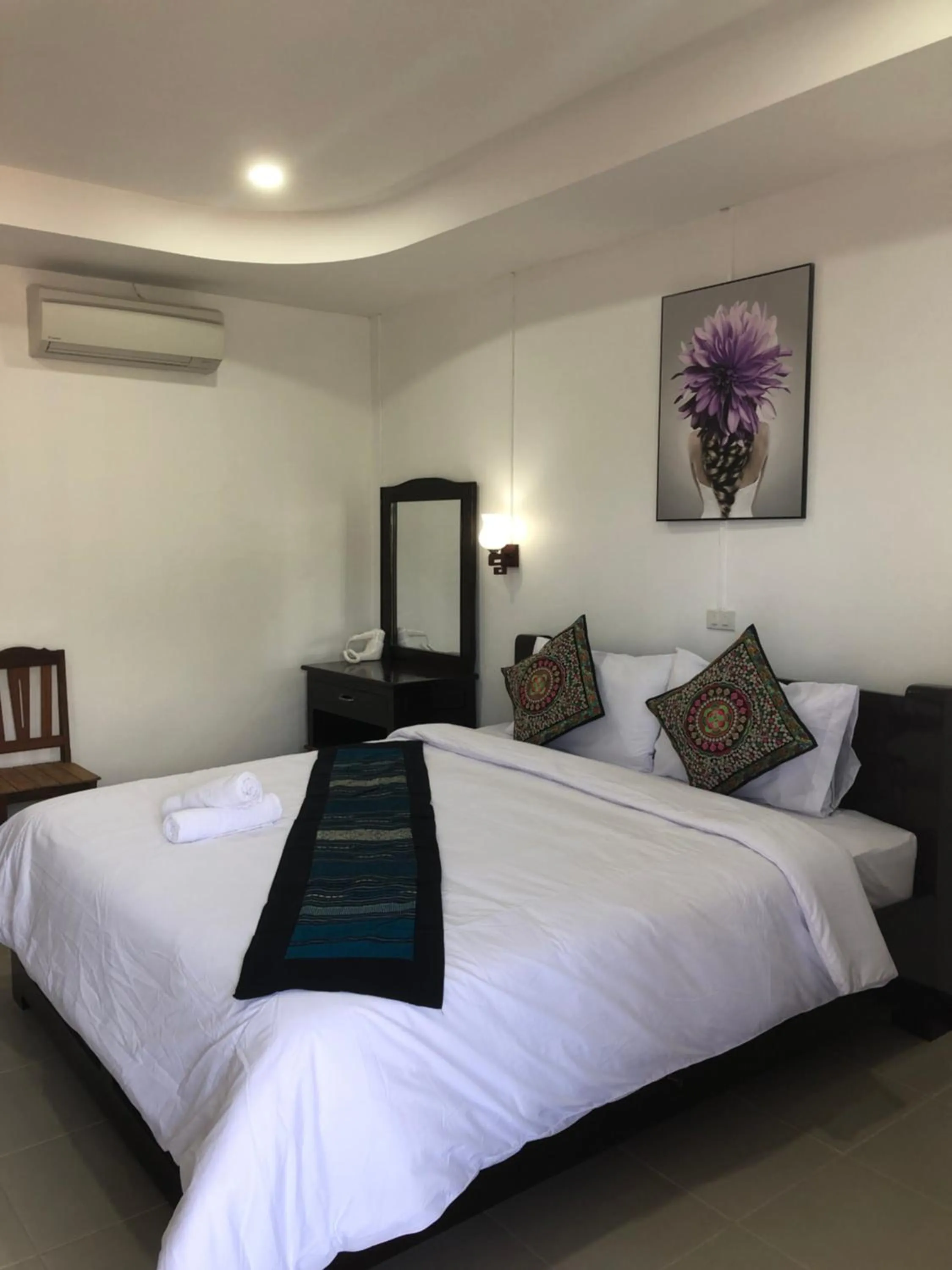 Photo of the whole room, Bed in Jasmine Vangvieng Hotel