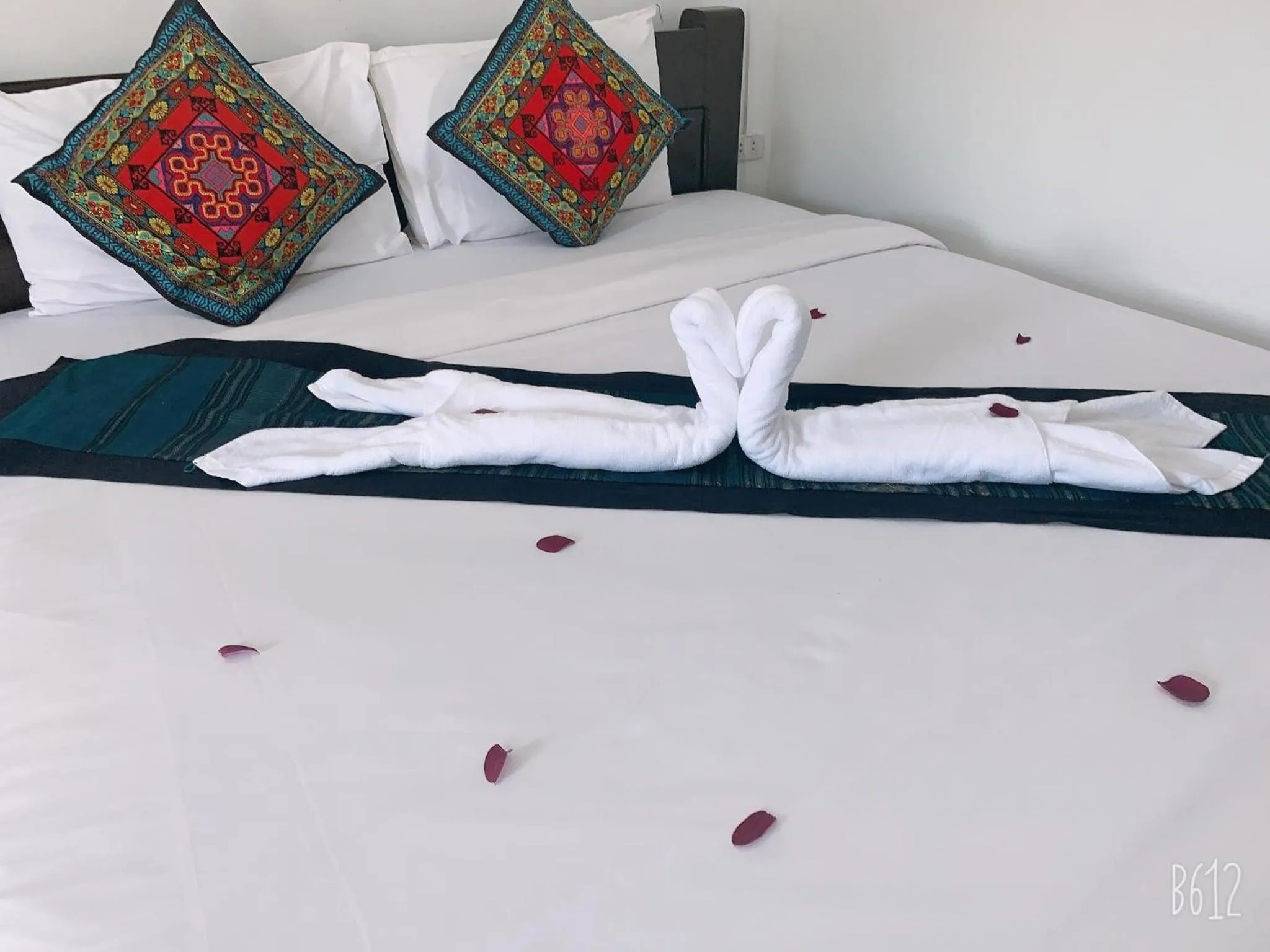 Bed in Jasmine Vangvieng Hotel