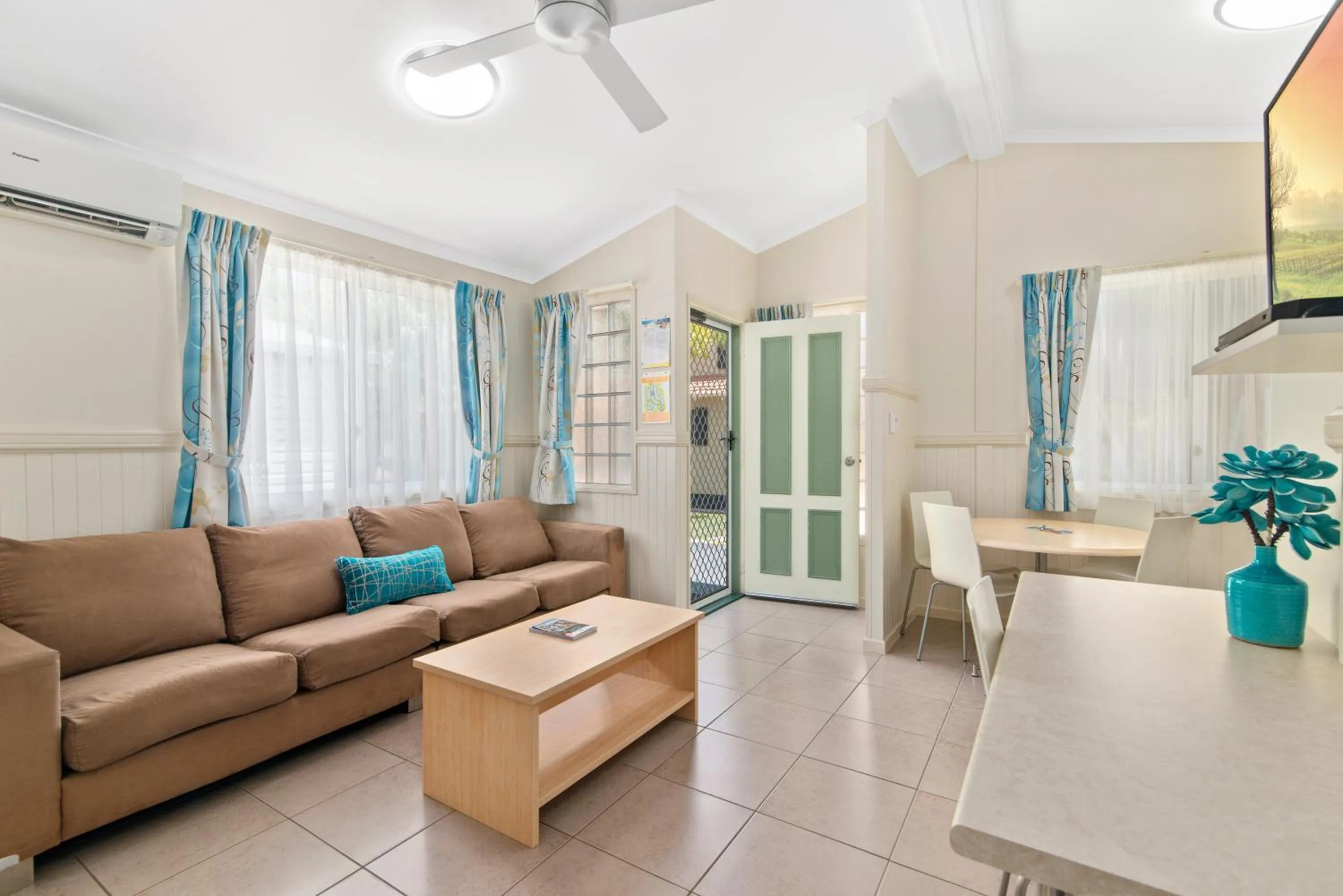 Living room in Ashmore Palms Holiday Village