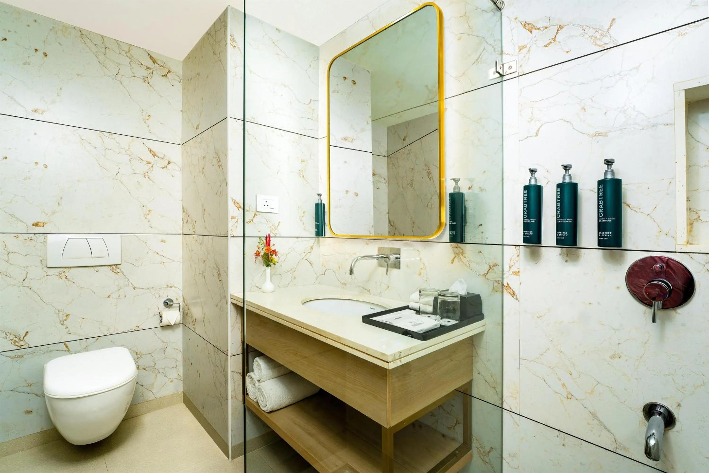 Bathroom in DoubleTree by Hilton Hotel Goa - Arpora - Baga