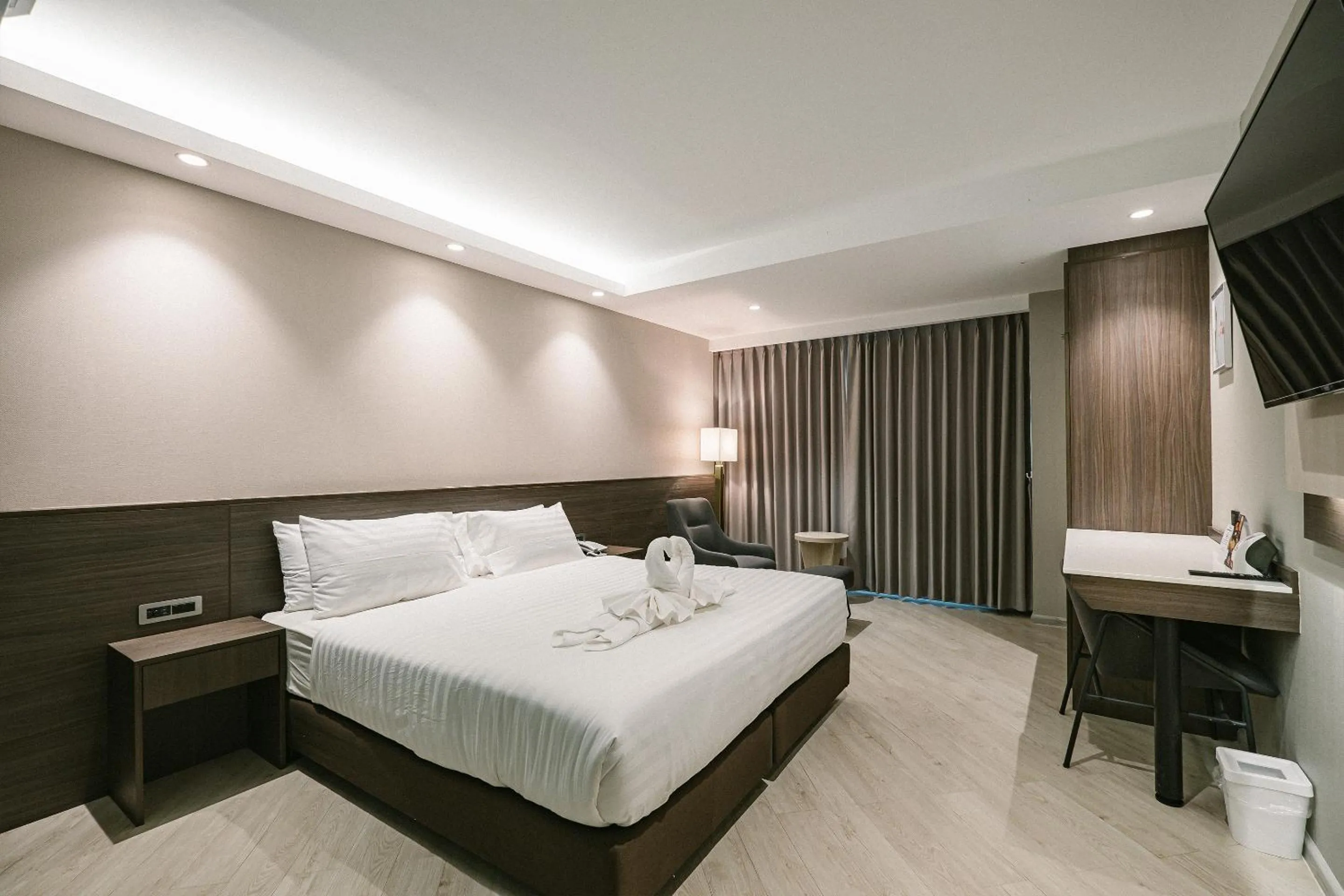 Bed in The Rich Hotel