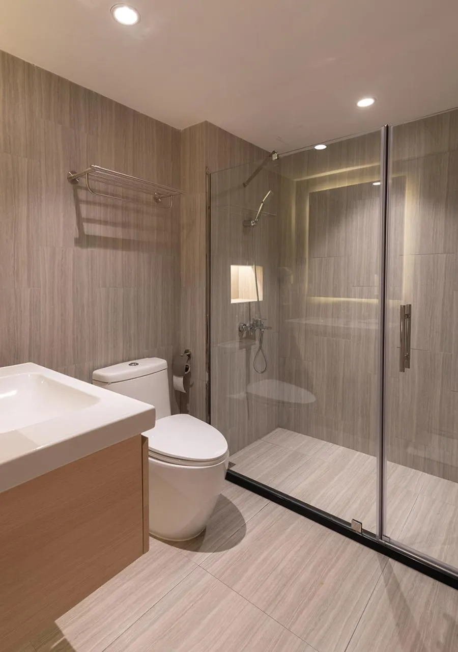 Shower in The Rich Hotel