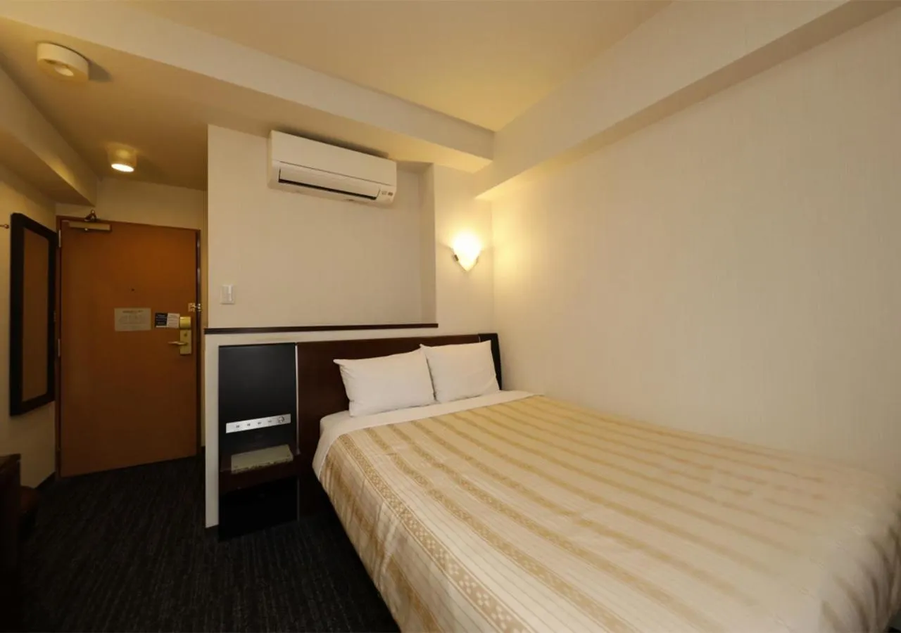 Photo of the whole room, Bed in Hotel Blion Naha