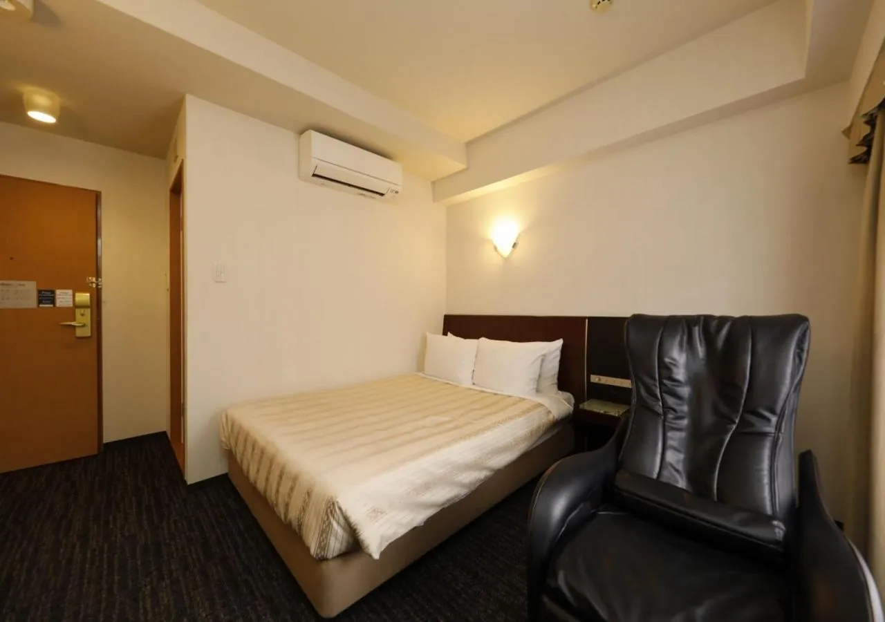 Photo of the whole room, Bed in Hotel Blion Naha