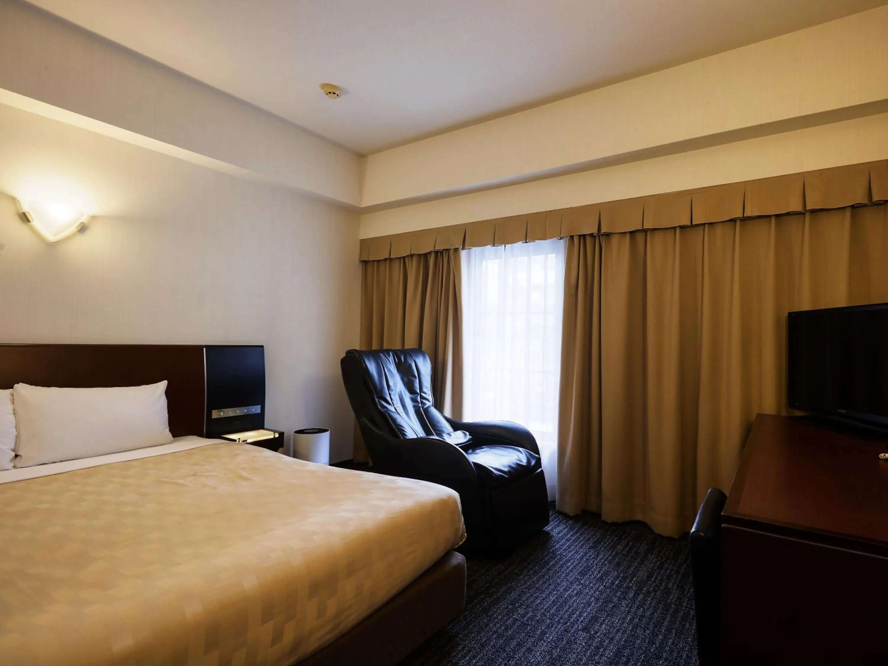 Photo of the whole room, Bed in Hotel Blion Naha