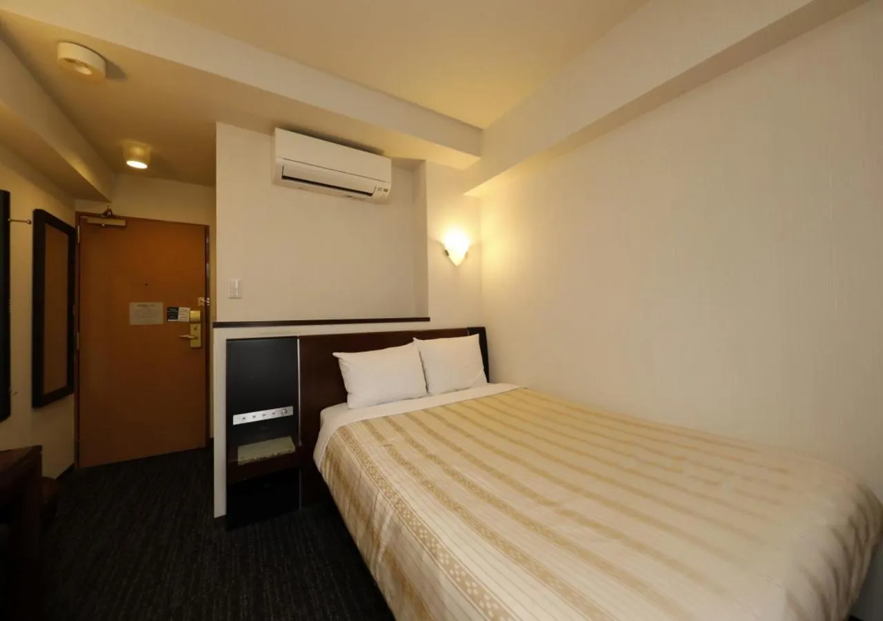 Photo of the whole room, Bed in Hotel Blion Naha